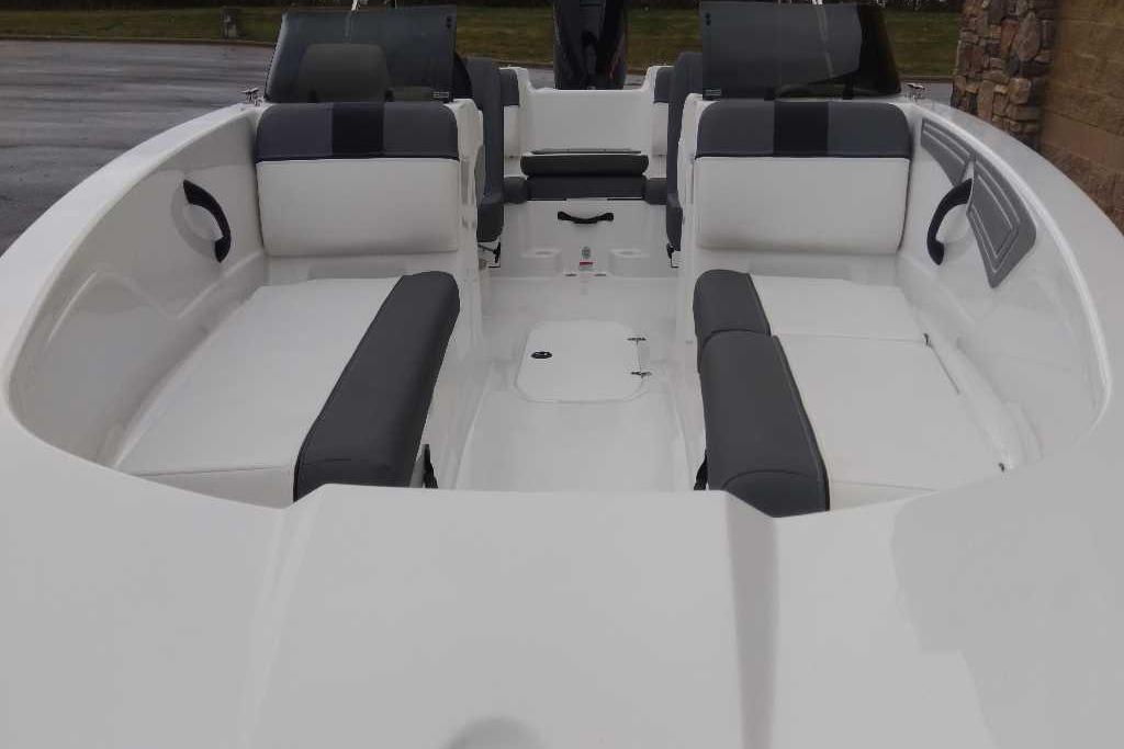 2026 Tahoe T21 boat interior with white and gray seating, spacious layout.