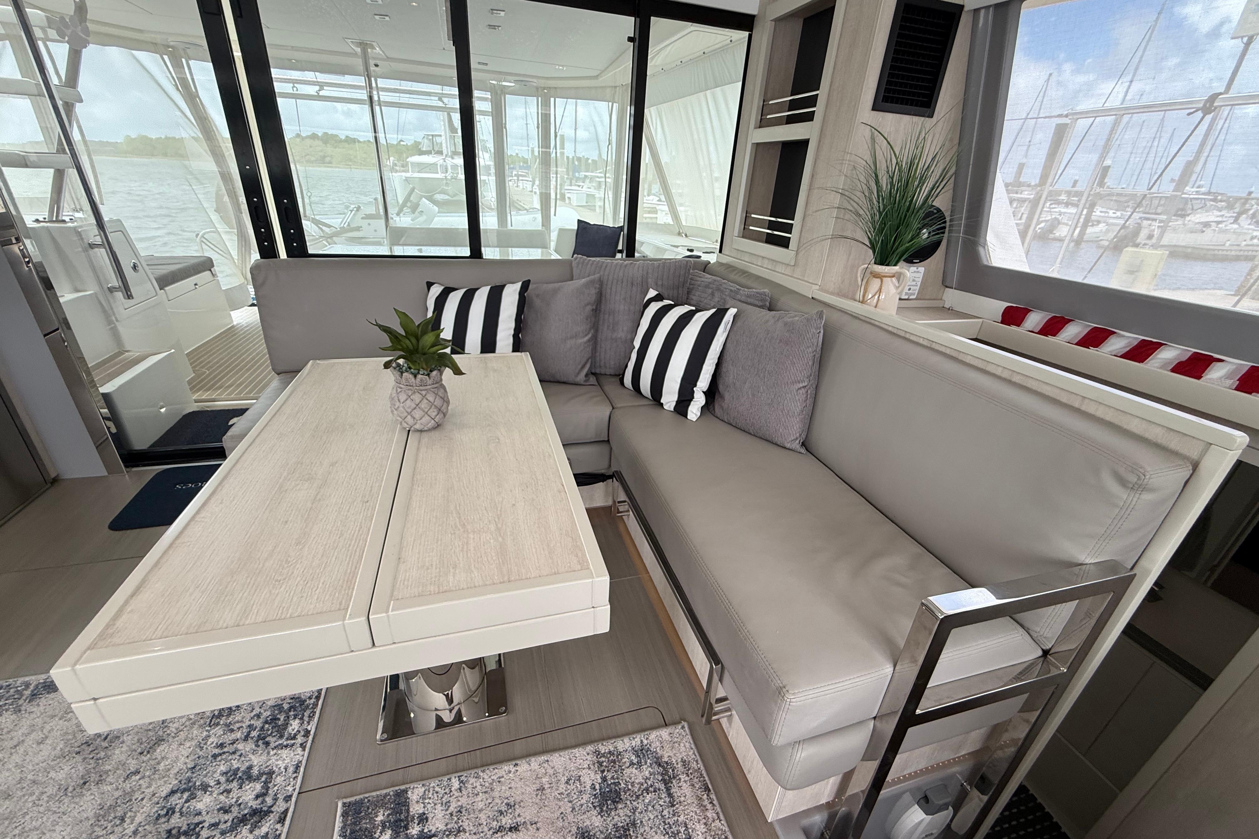 Luxurious interior of 2021 Leopard 43 Powercat with modern seating and stylish decor.