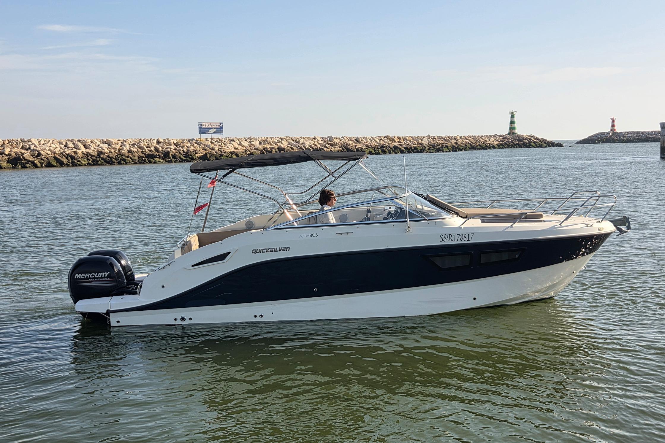 2017 Quicksilver Activ 805 Cruiser on calm water, featuring a Mercury outboard engine.