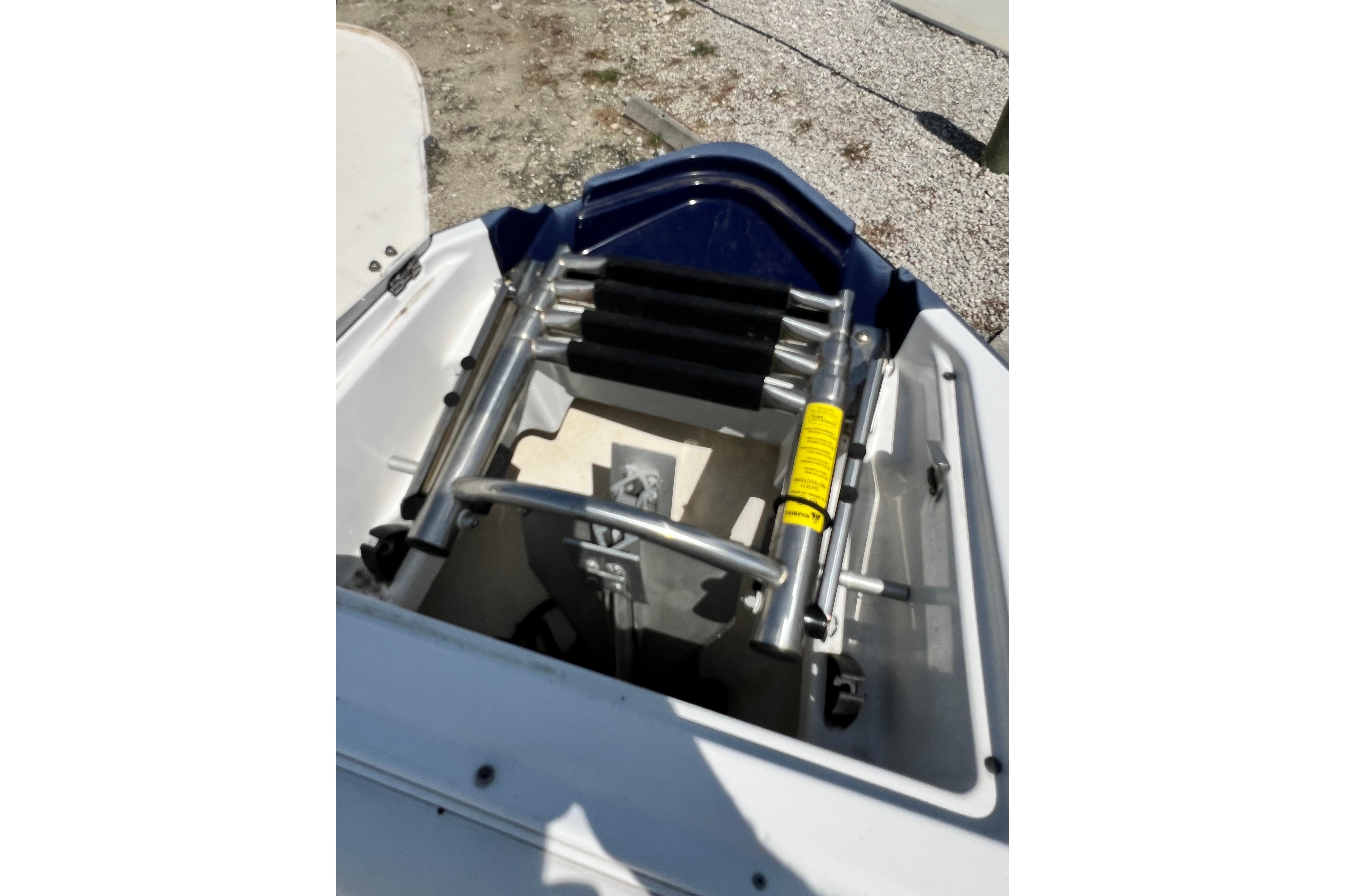2015 Monterey 268SS Super Sport boat ladder and storage compartment.