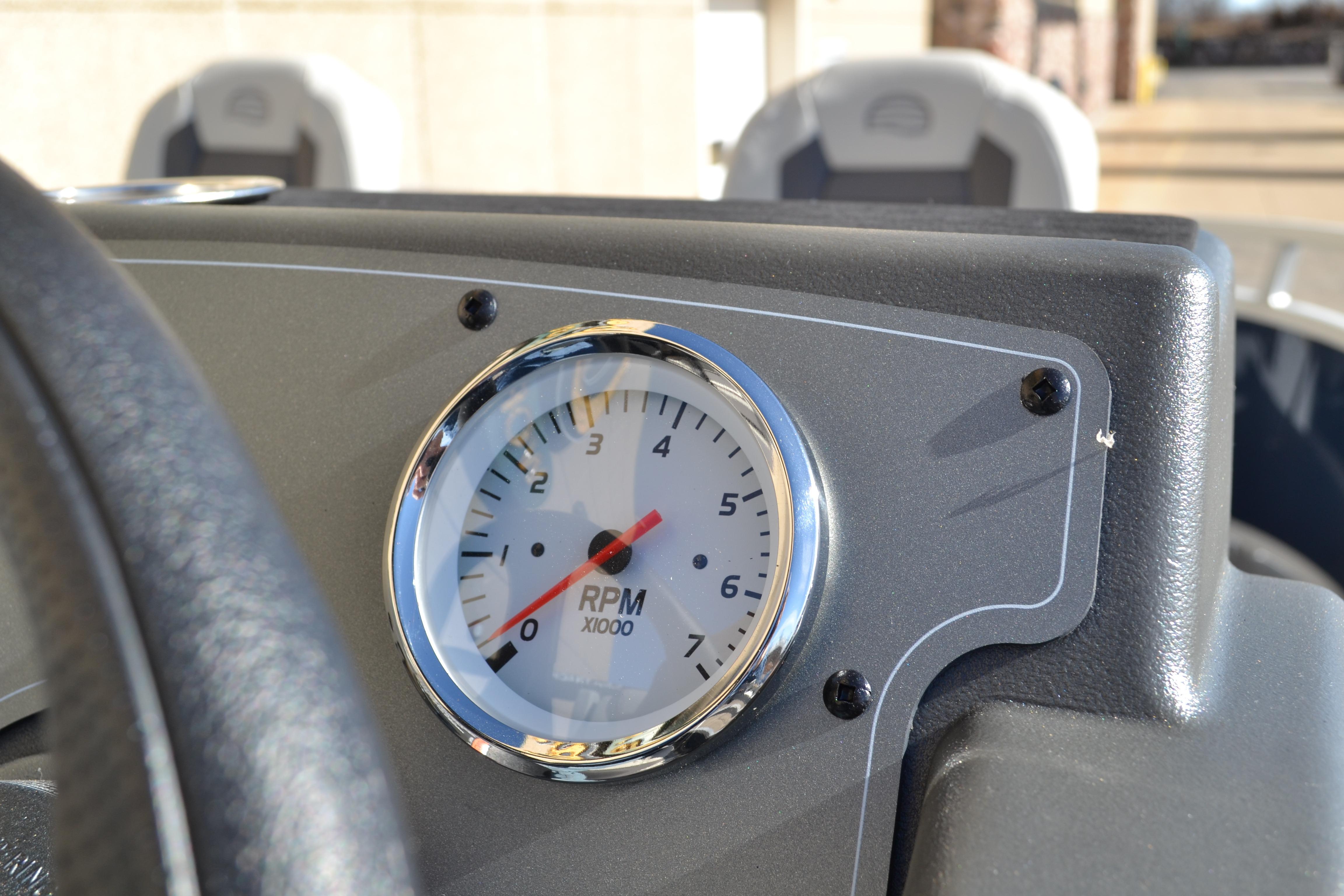 Close-up of RPM gauge on 2026 Sun Tracker Bass Buggy 16 XL Select boat dashboard.