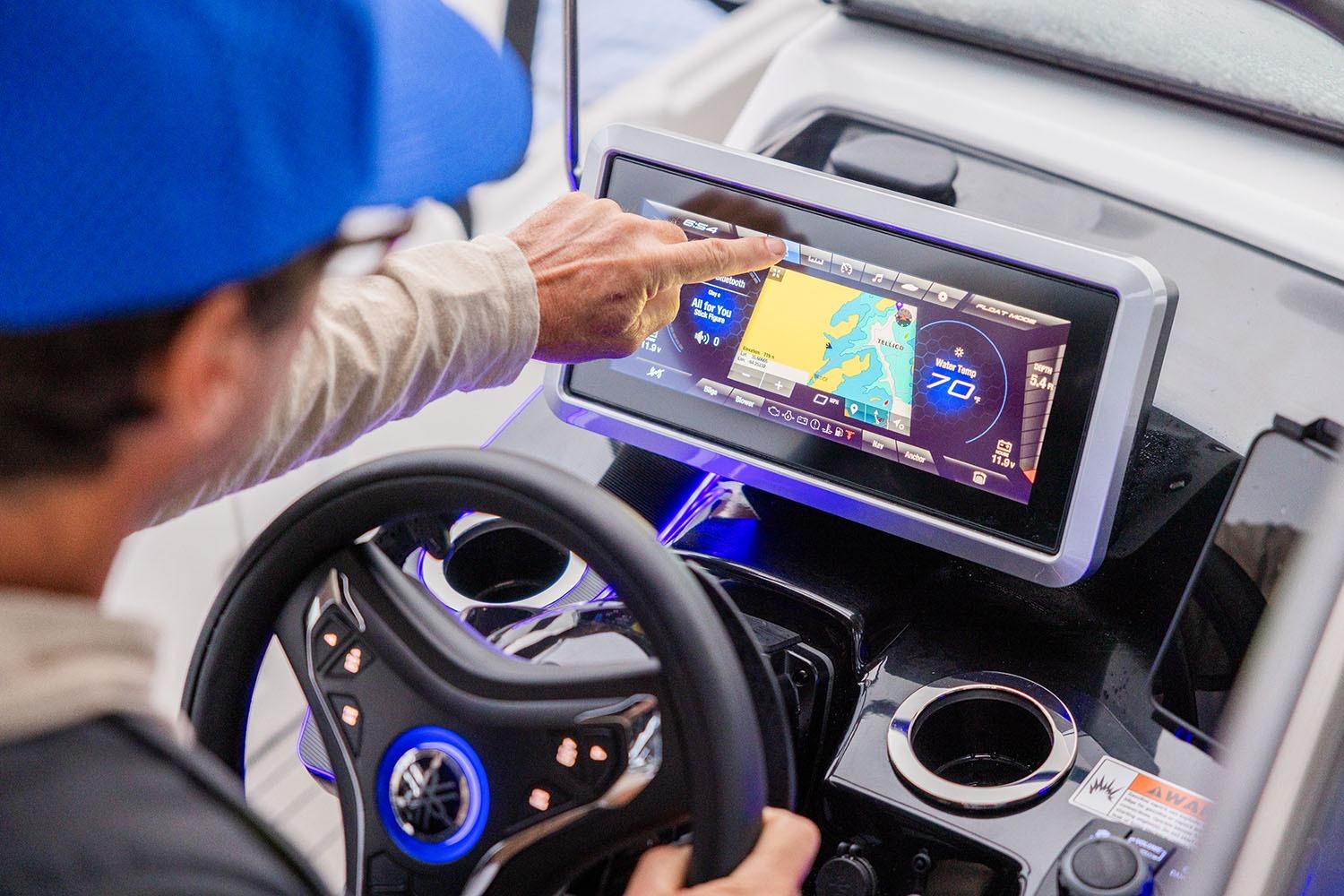 Manufacturer Provided Image: 2026 Yamaha Boats 252SD dashboard with touchscreen navigation system and steering wheel.