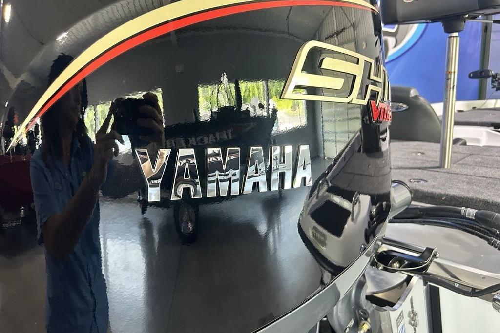 2026 Phoenix 818 Pro with Yamaha engine, showroom reflection.