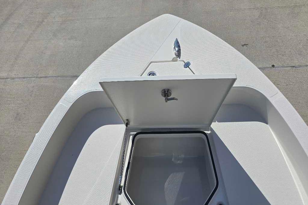 2025 Ranger 2360 Bay boat with open storage compartment on deck.