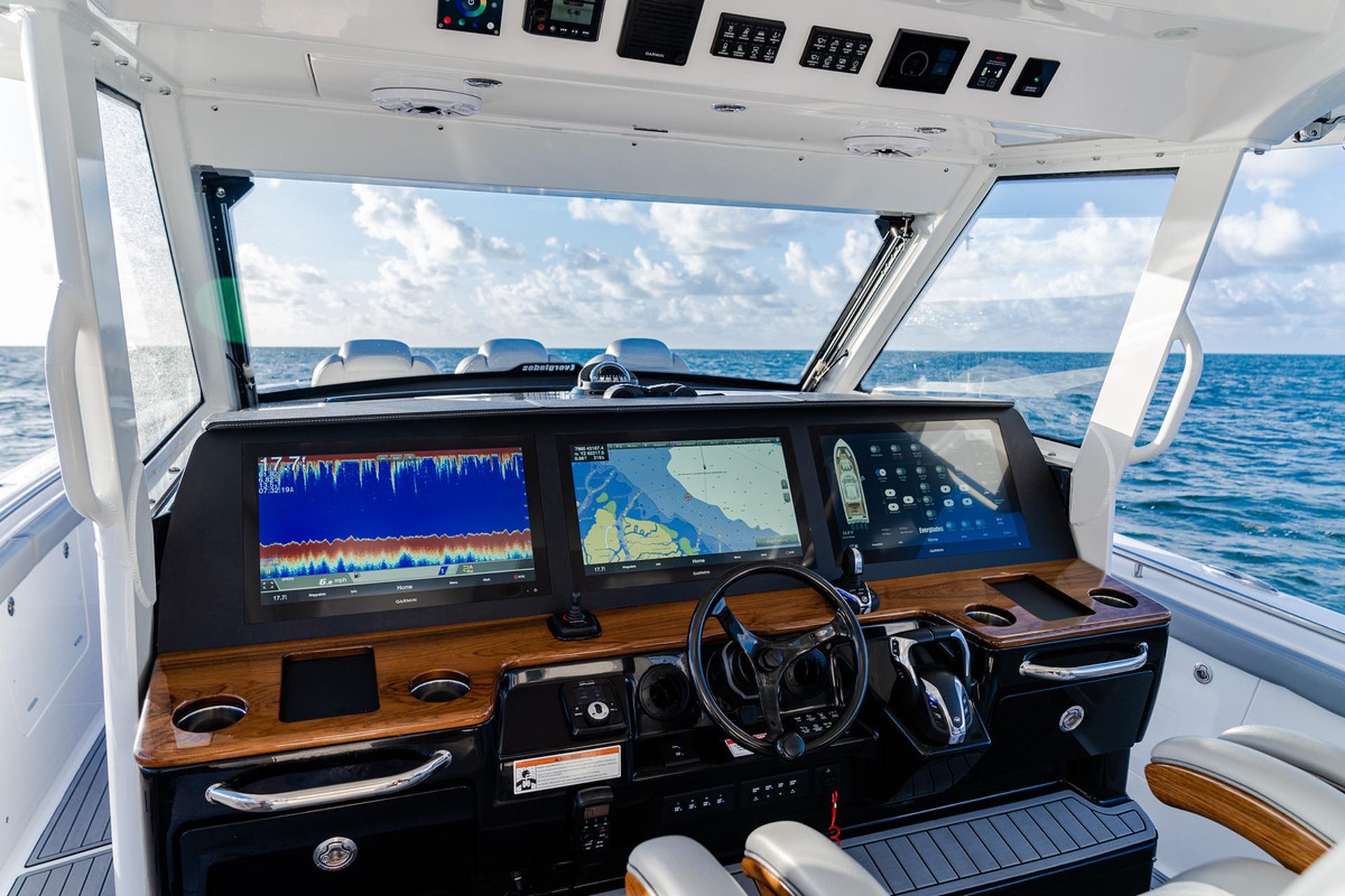 Cockpit of 2026 Everglades 455 Center Console with advanced navigation displays.