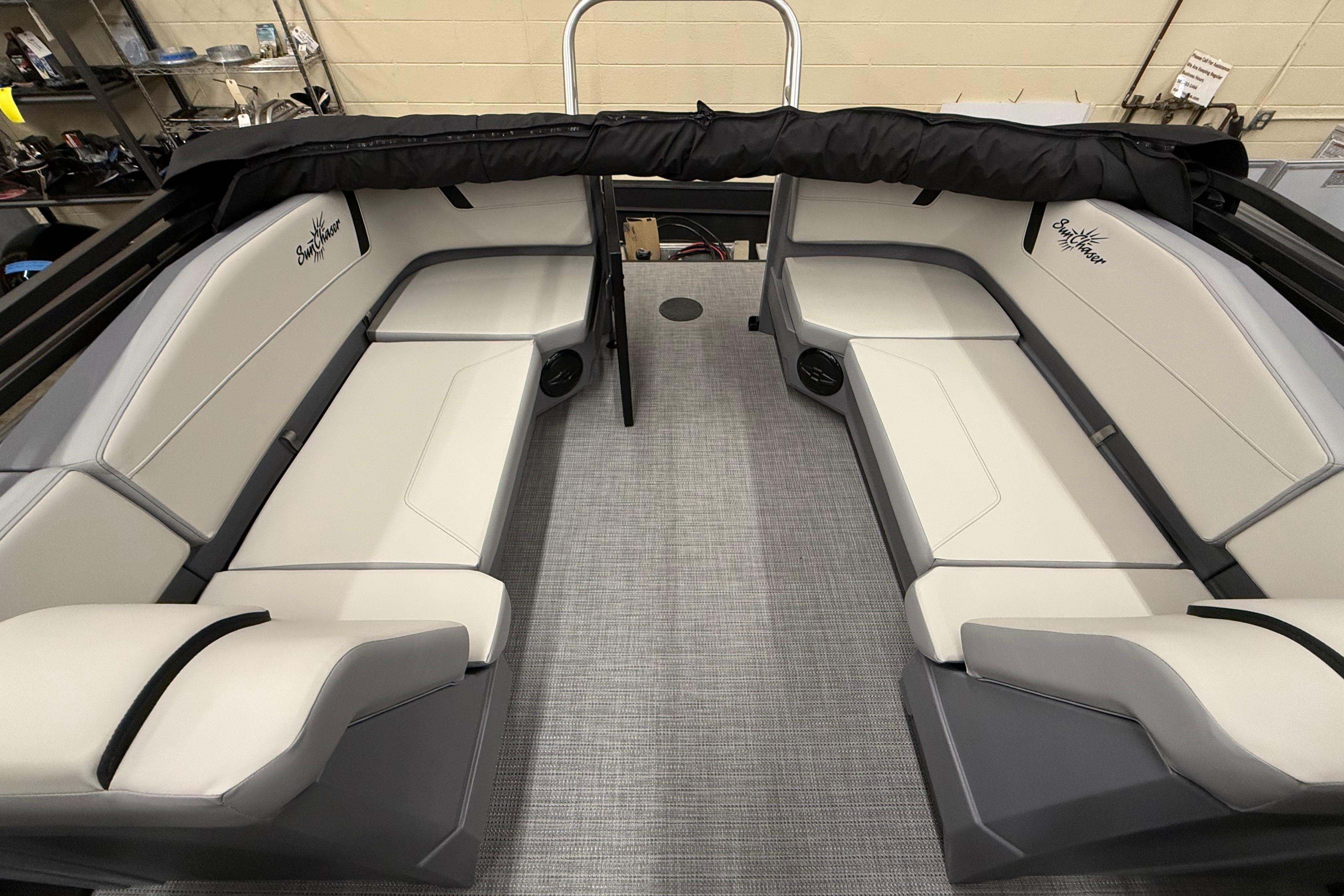 2025 SunChaser Lucerne 22 LR DH boat interior with sleek seating and modern design.