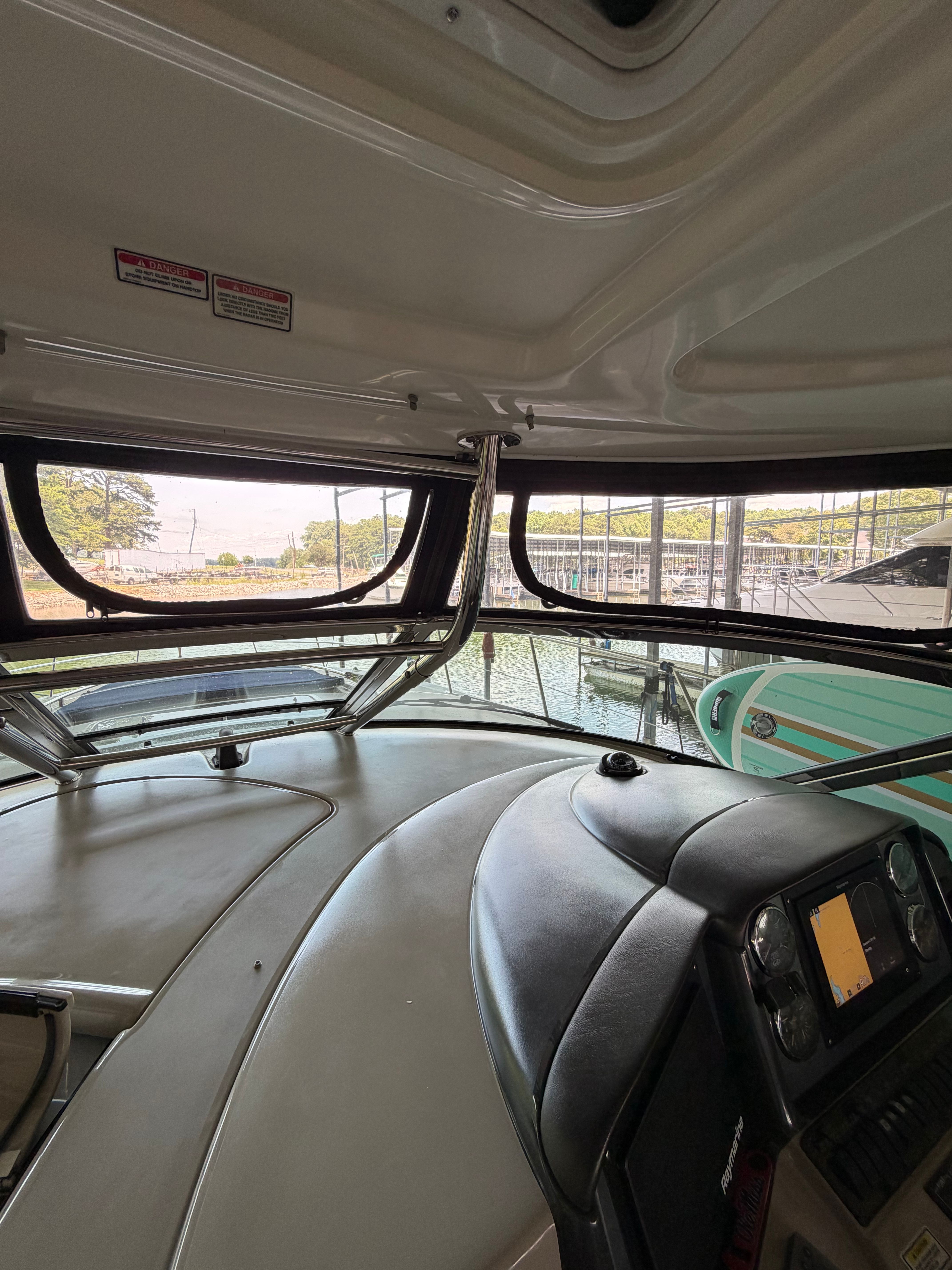 Interior view of a 2005 Sea Ray 420DA with a view of the water.