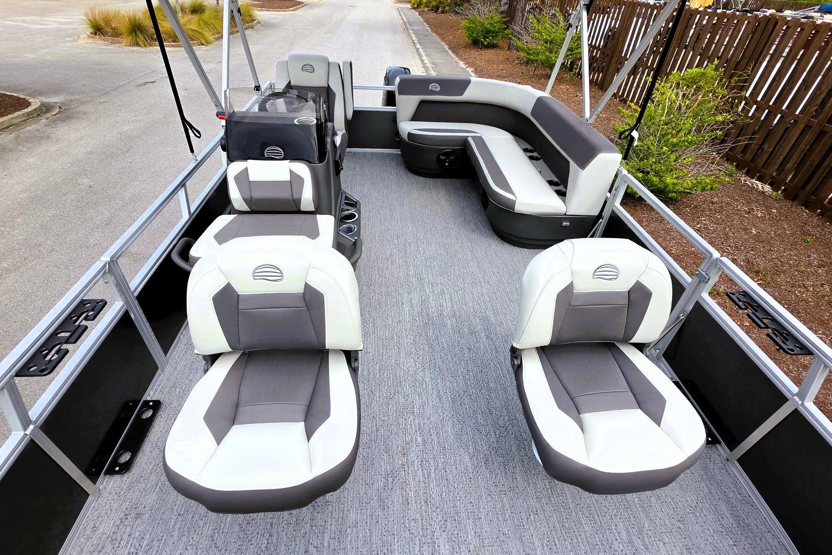 2026 Sun Tracker Bass Buggy 16 XL Select pontoon boat interior with seating and helm.