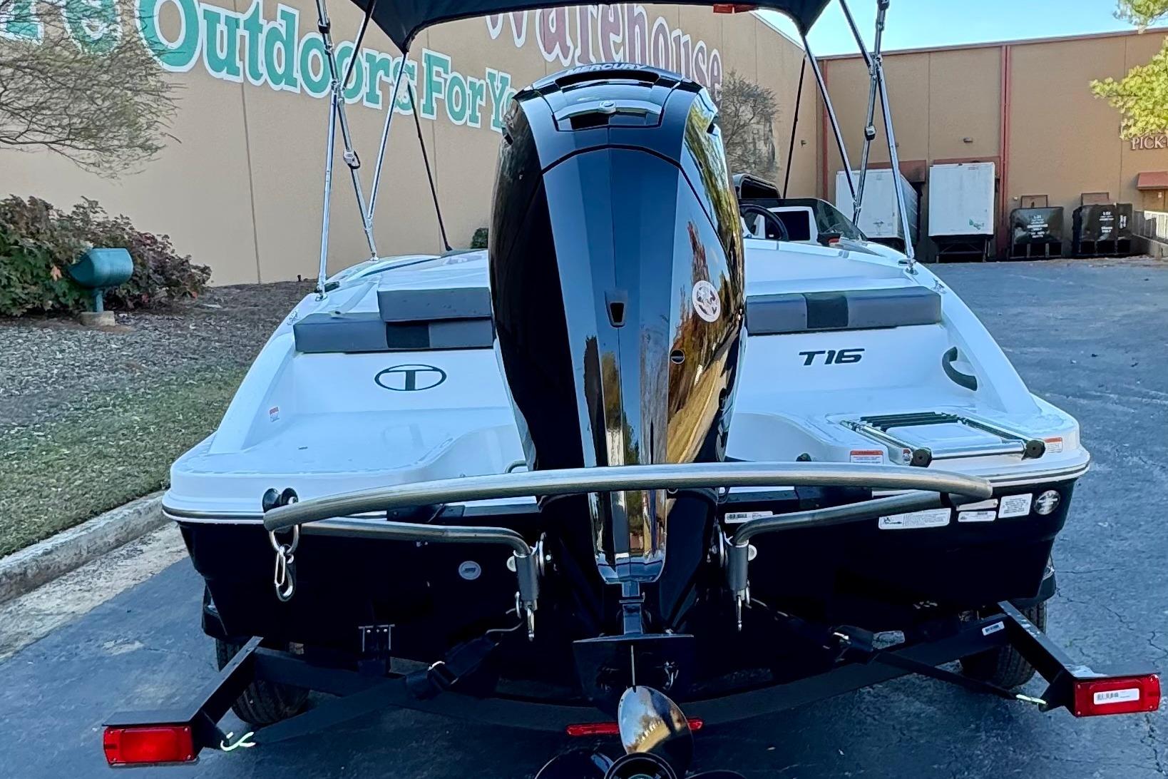 2026 Tahoe T16 boat on trailer, outdoor setting, rear view.