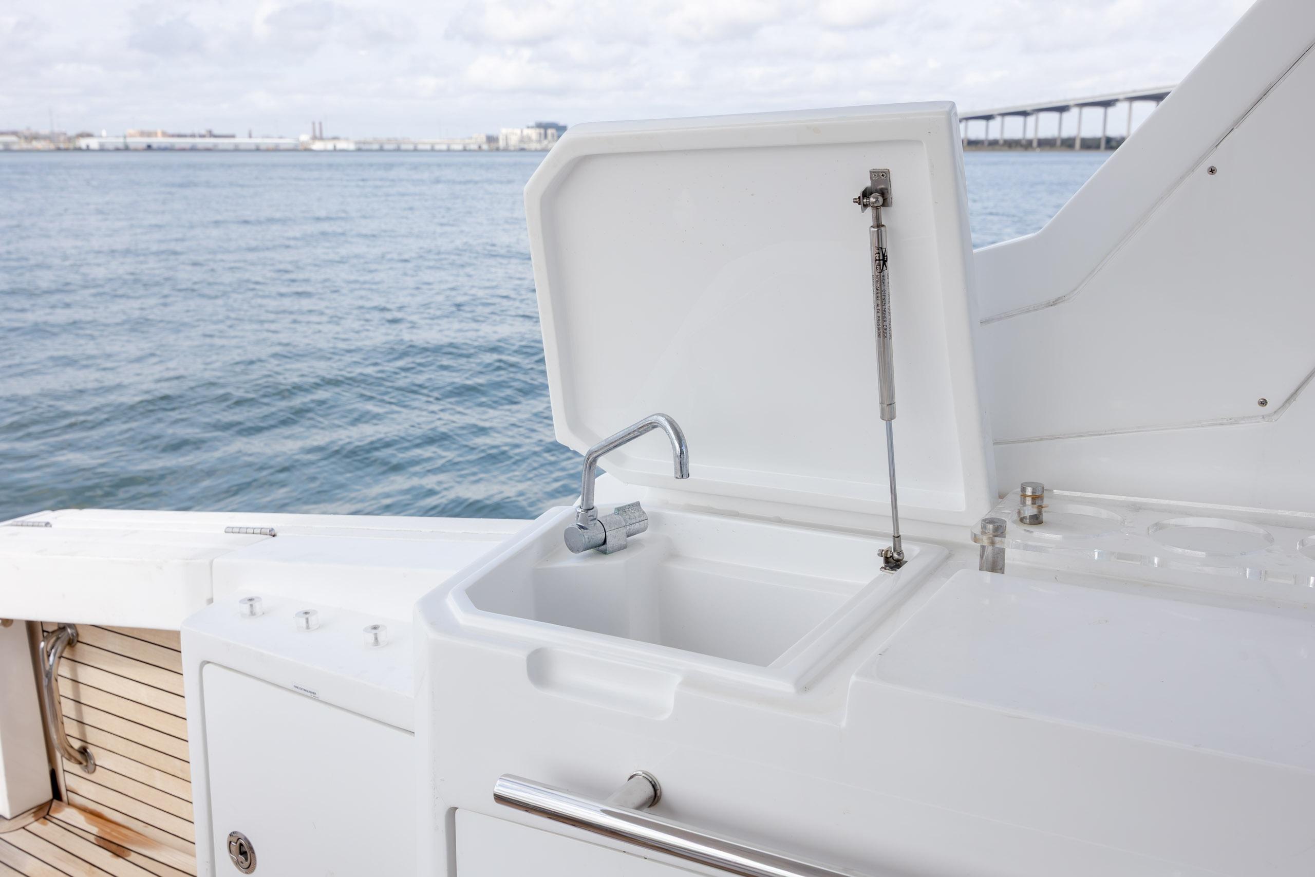 2019 Azimut Verve 40 yacht sink with ocean view in background.