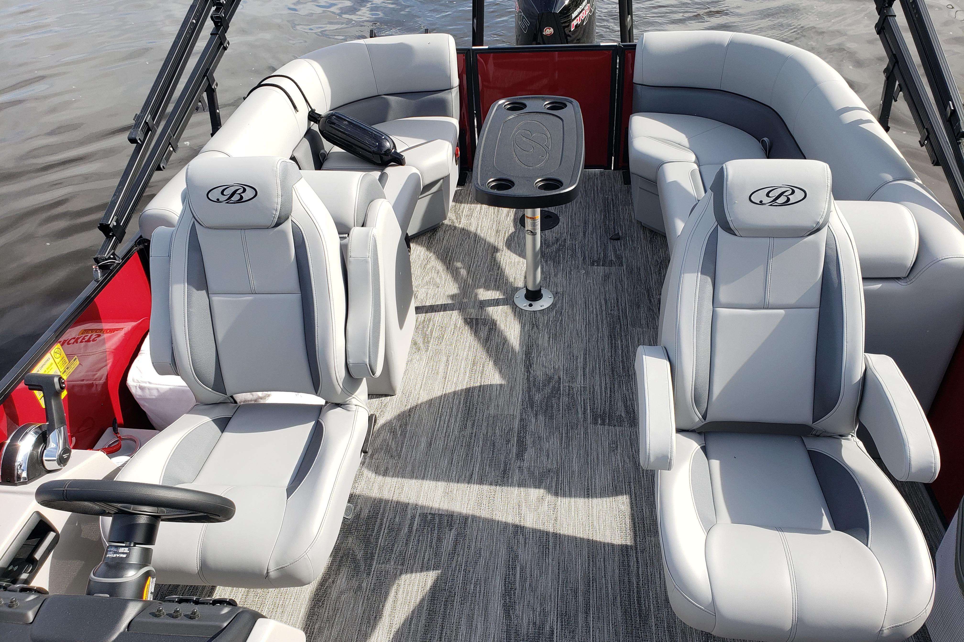 2026 Bentley Pontoons Legacy 243 Navigator Ext with luxurious seating and modern design.