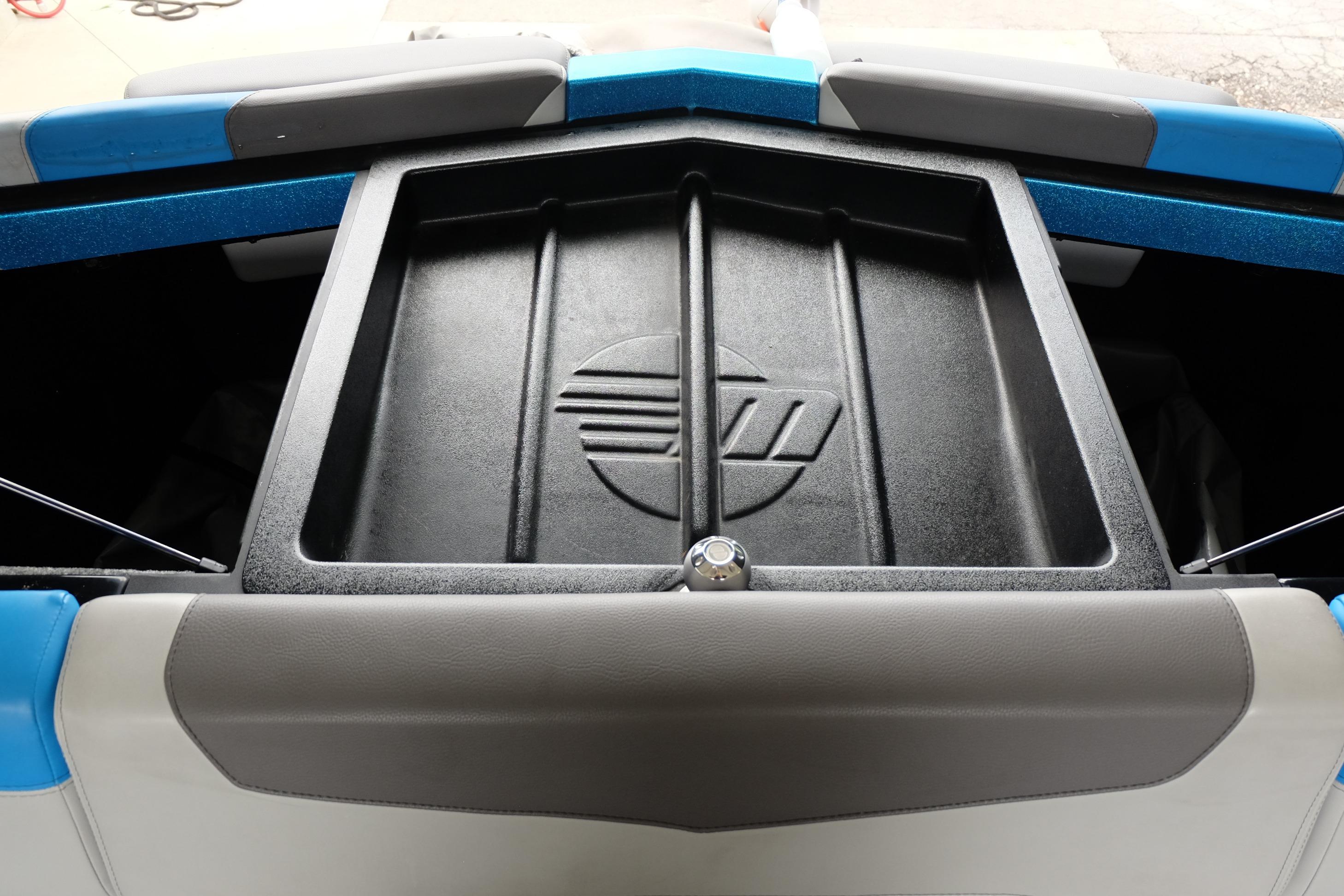 2020 Malibu Wakesetter 23 LSV storage compartment with sleek design and logo detail.