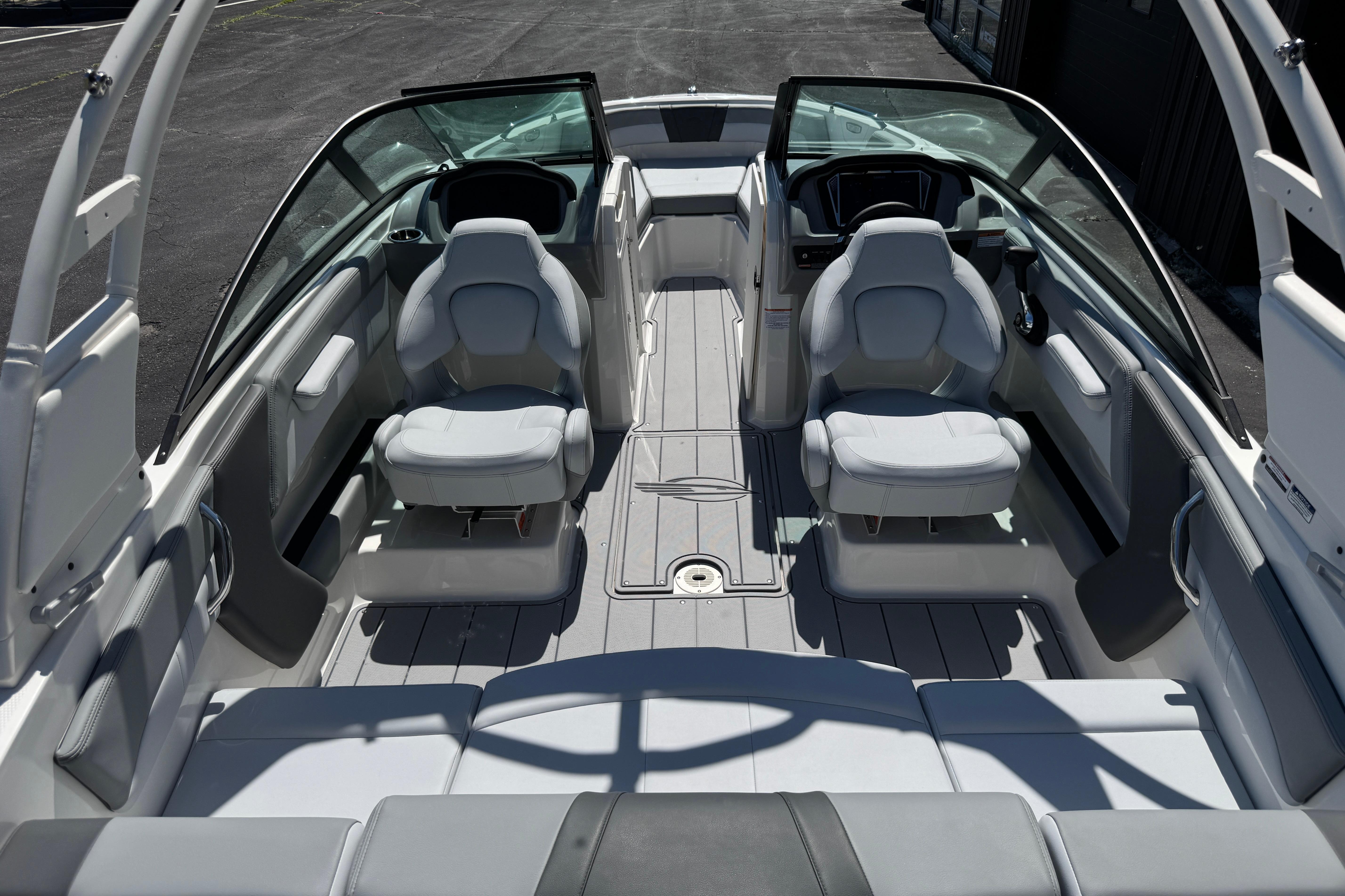Interior view of 2026 Chaparral 21 SSi boat, featuring sleek seating and modern design.