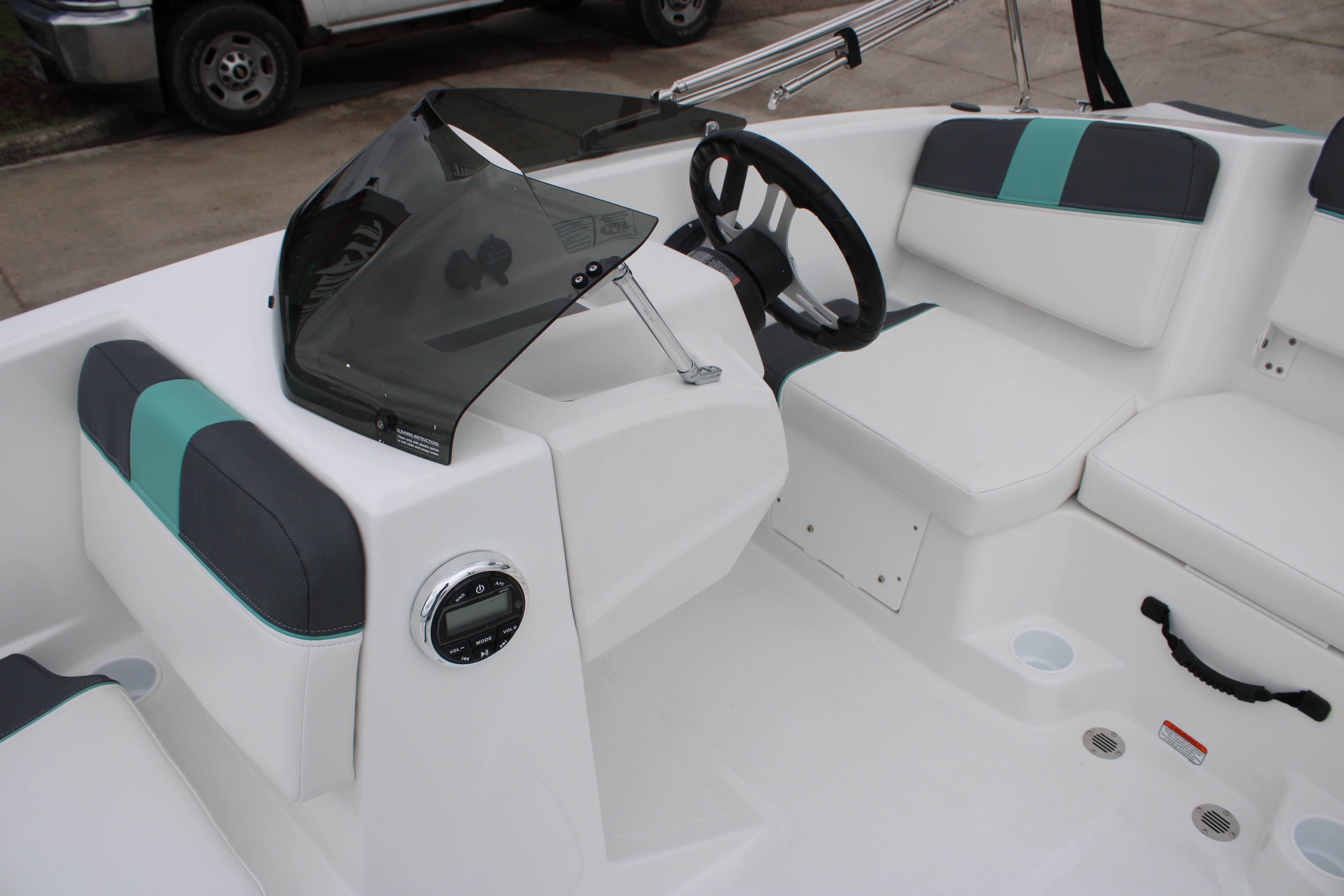 2026 Tahoe T16 boat interior with modern steering and seating design.