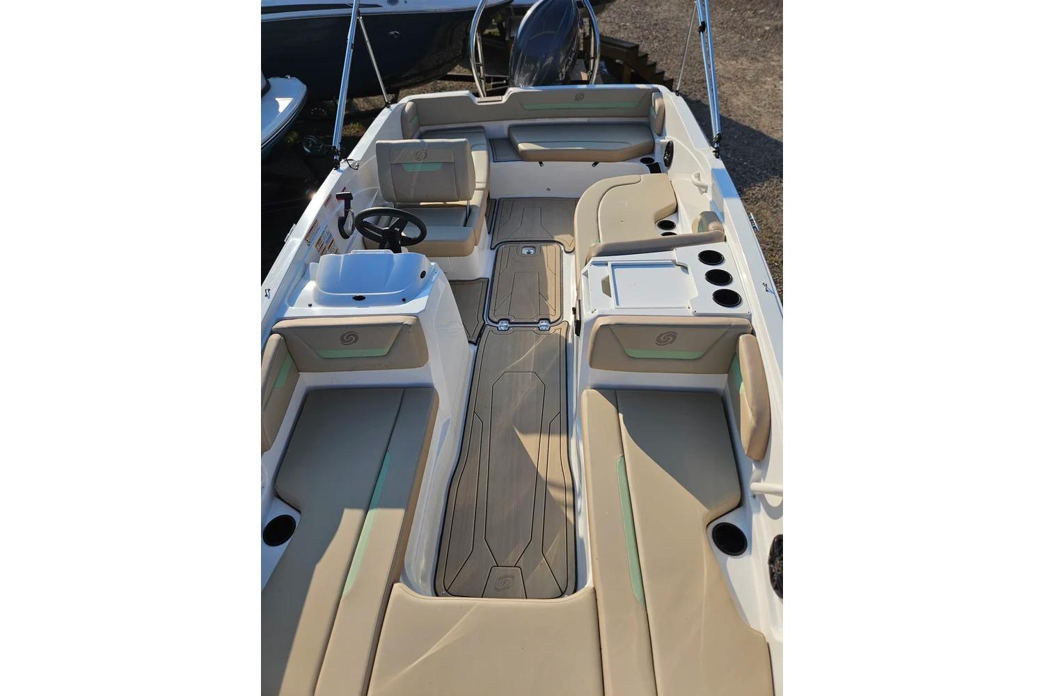 2025 Hurricane SunDeck Sport 205 OB boat interior with spacious seating and modern design.