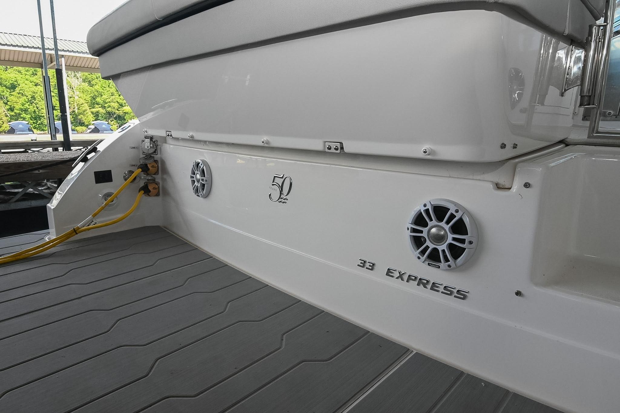 2021 Regal 33 Express boat stern with speakers and power connections.