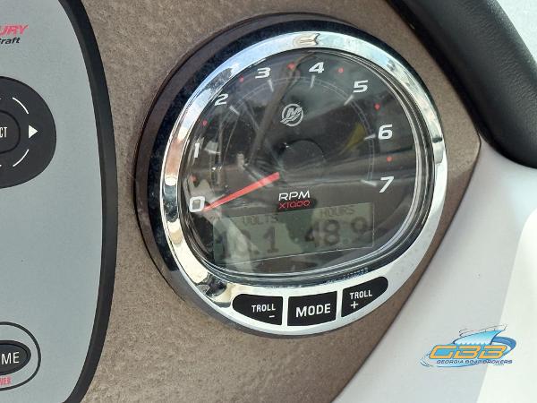 Close-up of 2008 Sea Ray 270 SLX tachometer displaying RPM and controls.