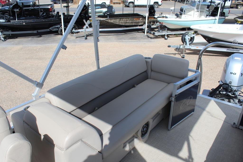 2021 Avalon VLS Quad Lounge 22 FT pontoon boat interior with beige seating.