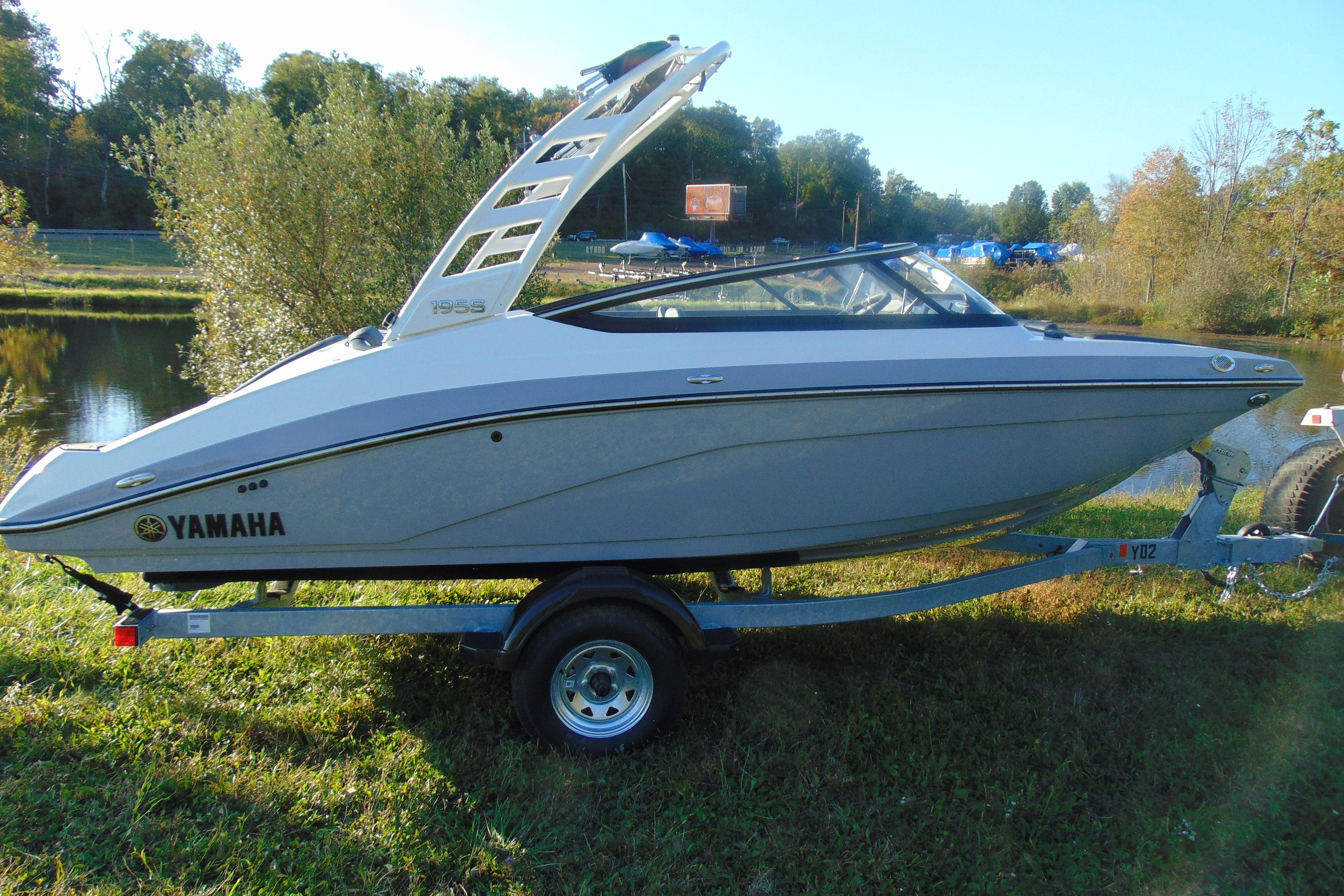 2026 Yamaha Boats 195S on trailer by a scenic lake.