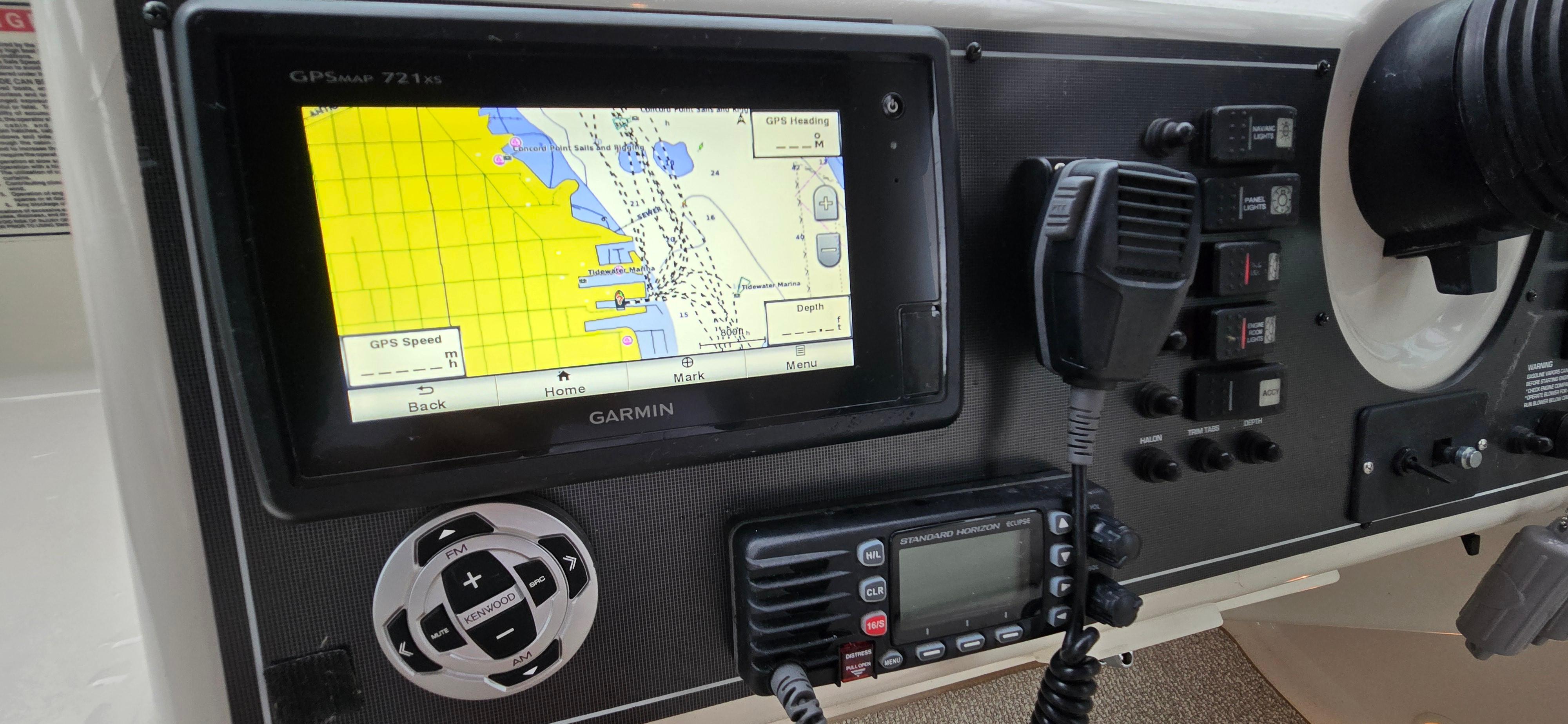 Garmin GPS and radio system on 2002 Monterey 322 Cruiser dashboard.