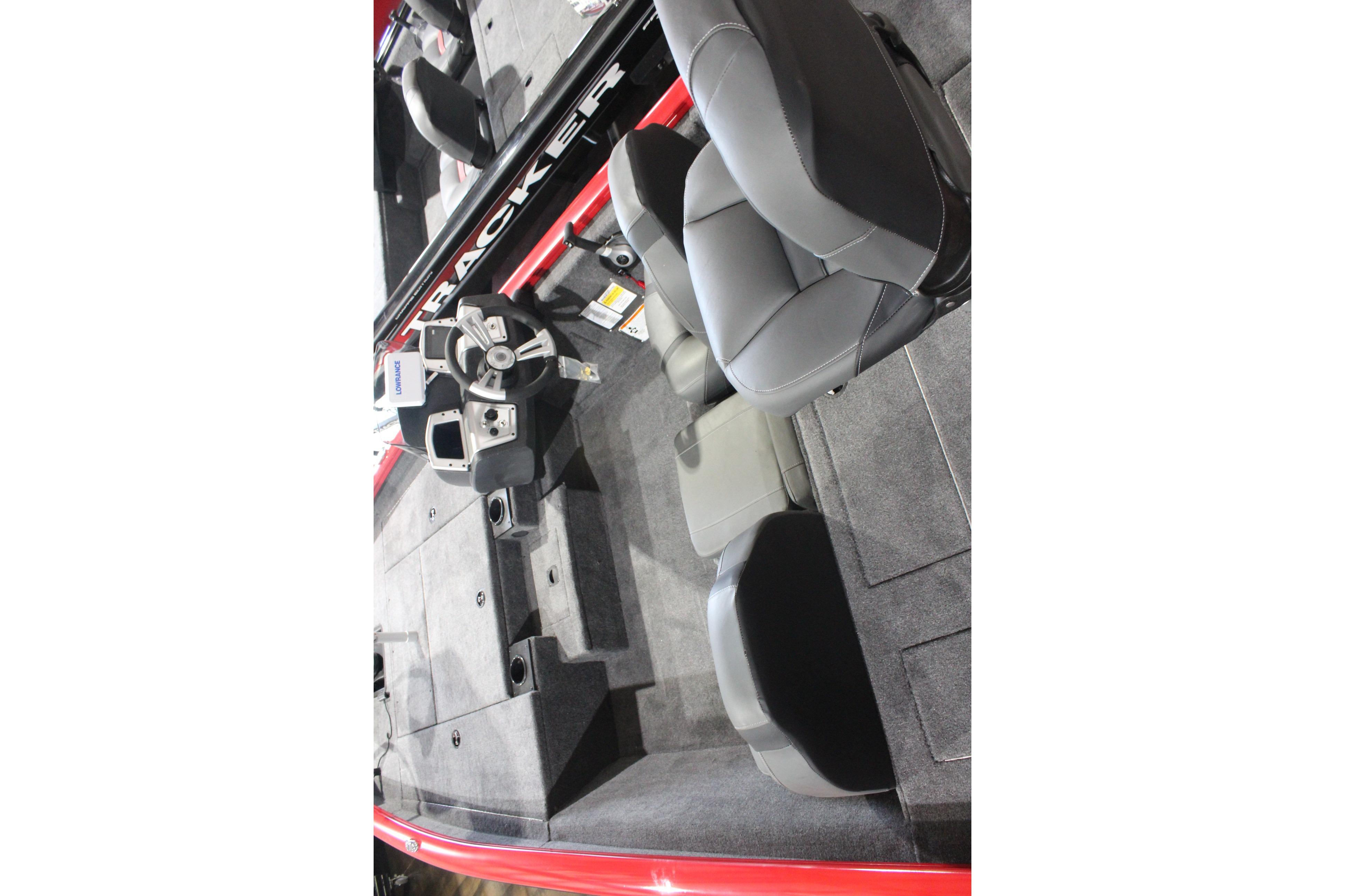 2026 Tracker Pro Team 175 boat interior with steering wheel and seating.
