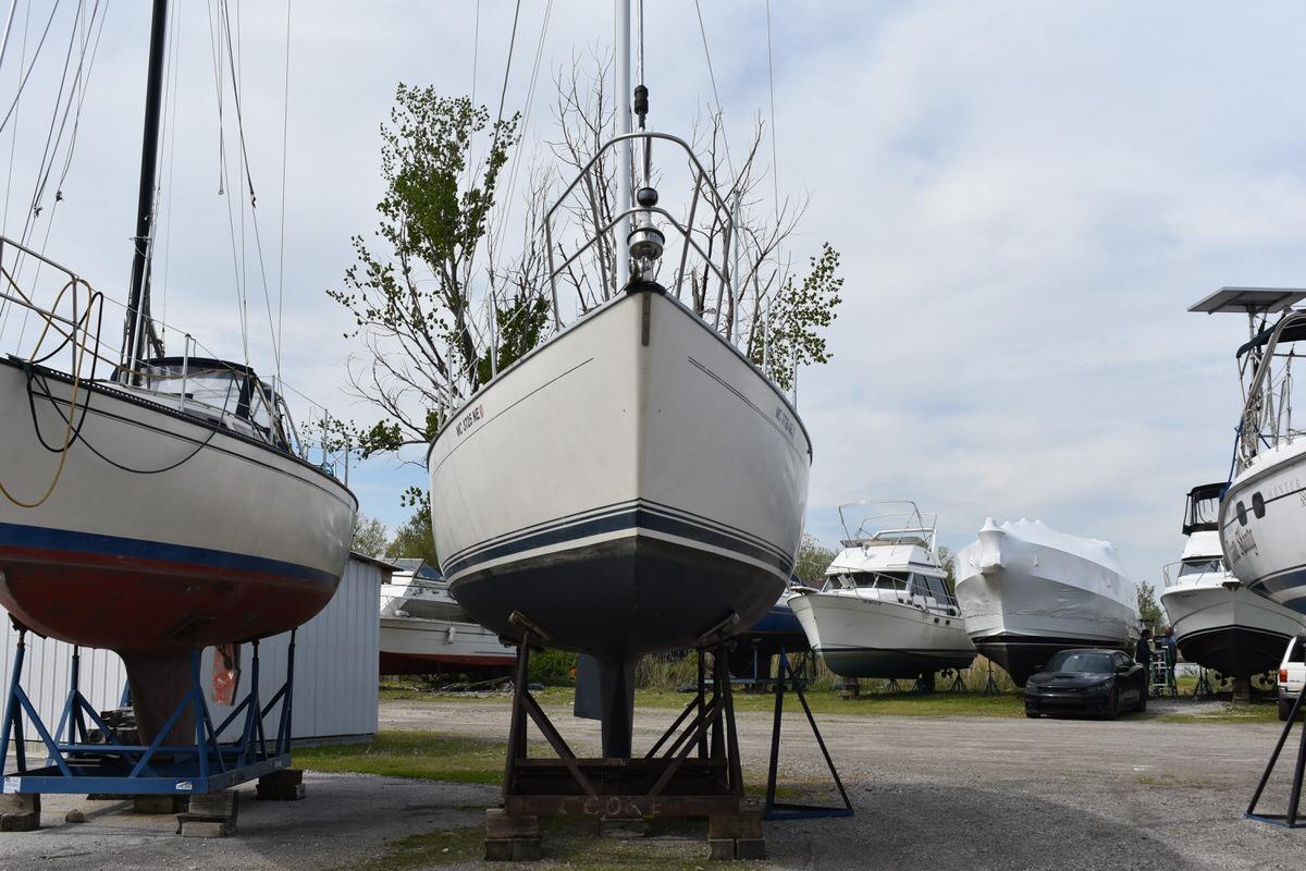 1987 S2 9.2A sailboat on a stand on land.