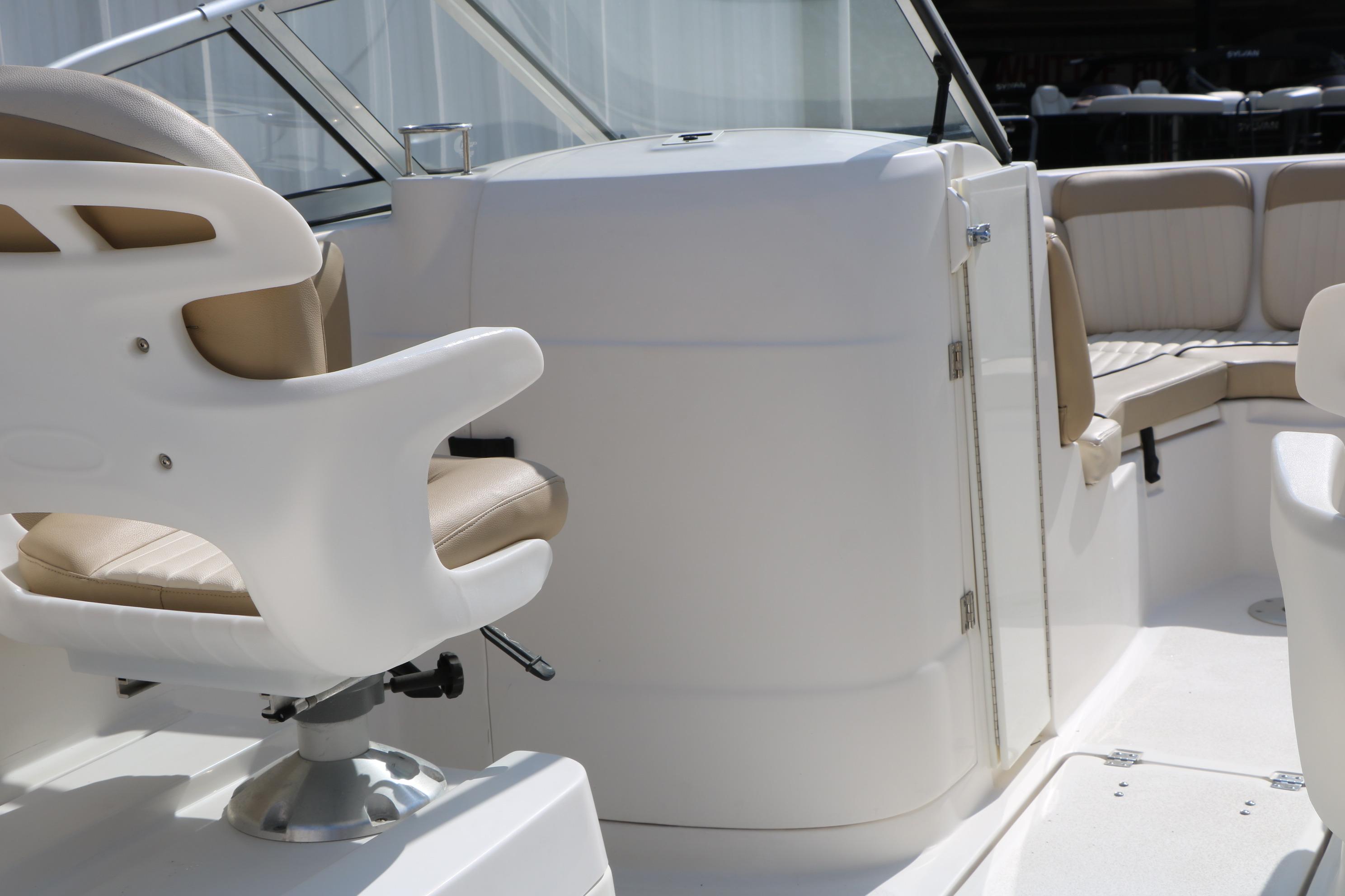 2017 Sea Fox 226 Traveler boat interior with seating and helm station.