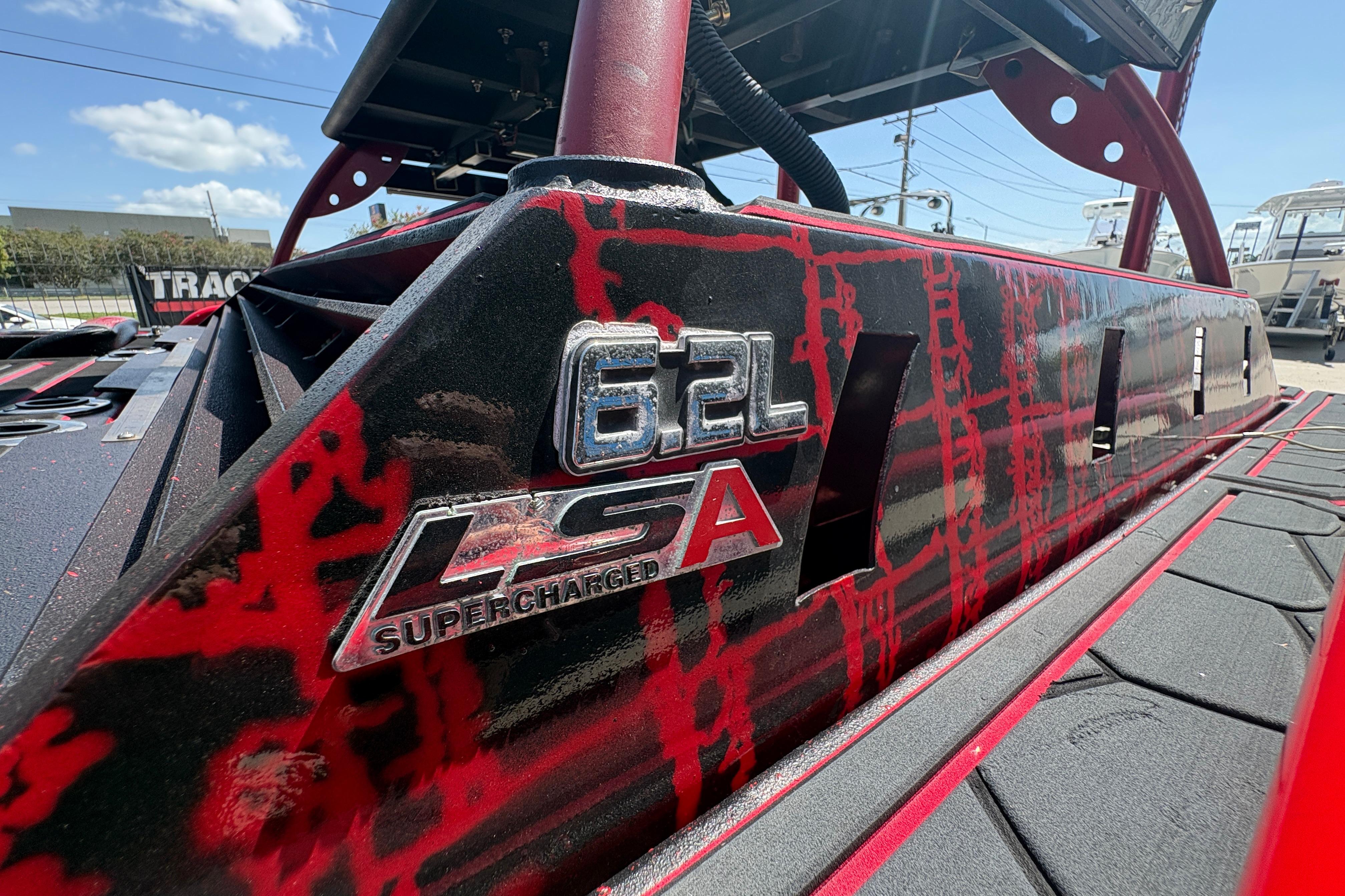 Custom 2018 Swamp Shark 24' boat with 6.2L LSA supercharged engine detail.