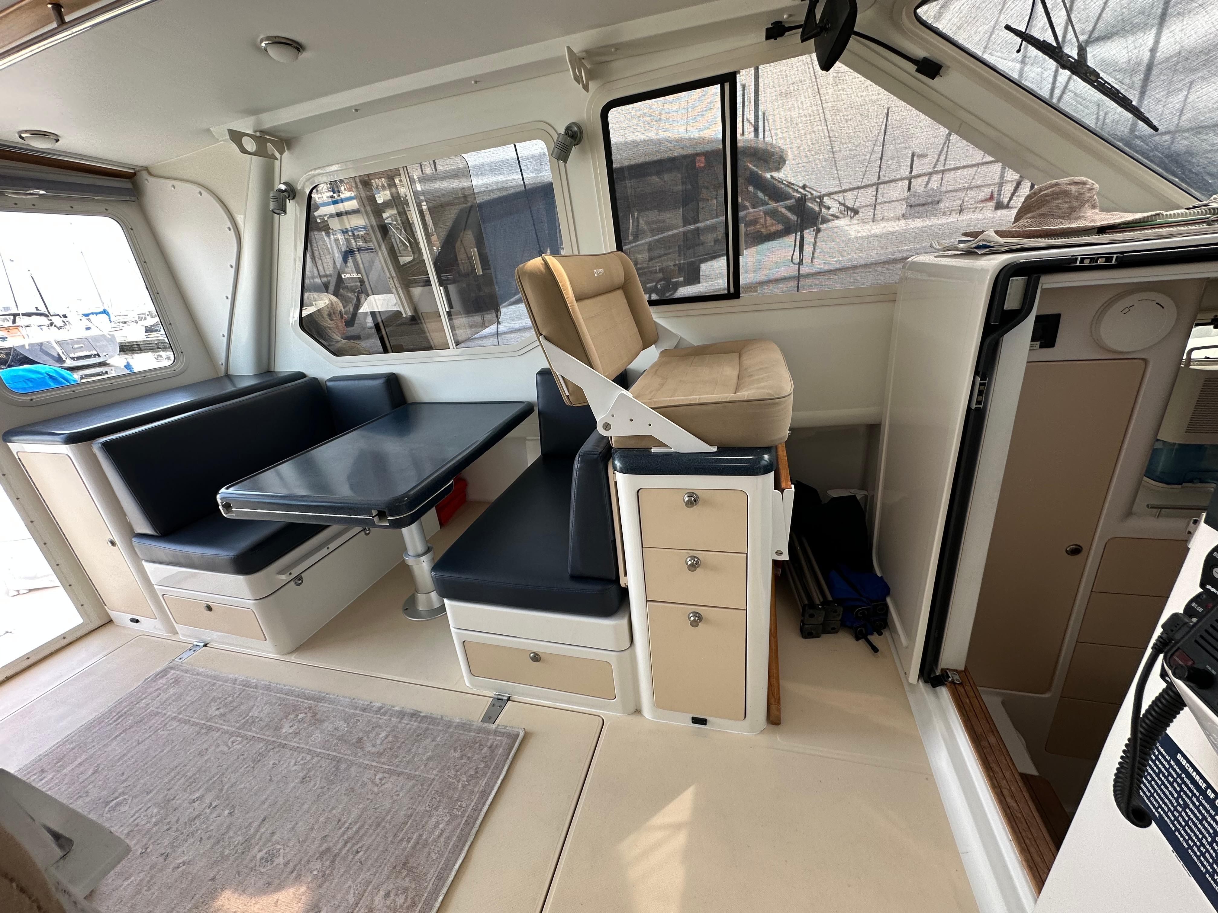 Interior of 2002 True North 38 boat with seating and navigation area.
