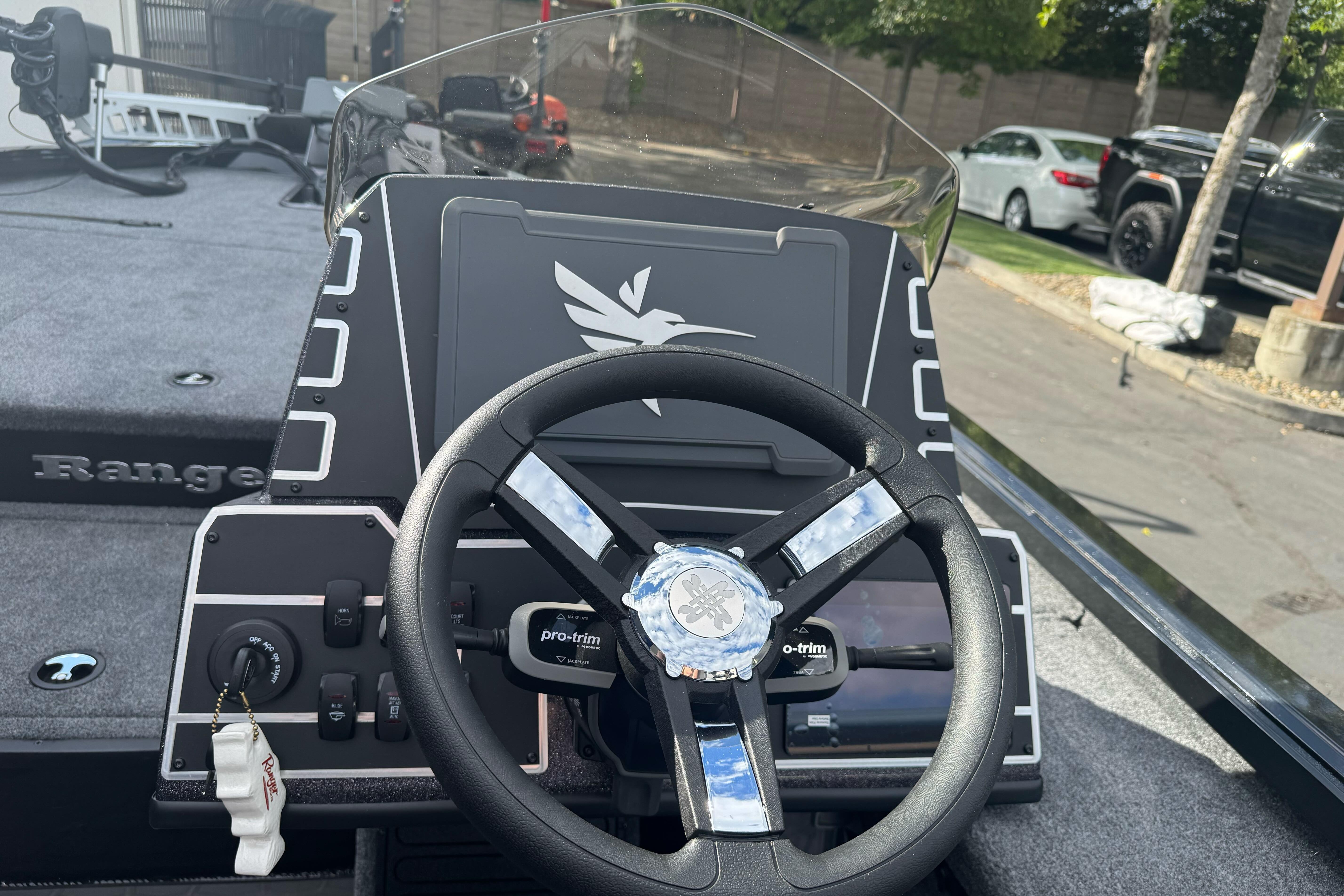 Steering console of 2026 Ranger ALPHA 208 boat, featuring modern controls and sleek design.