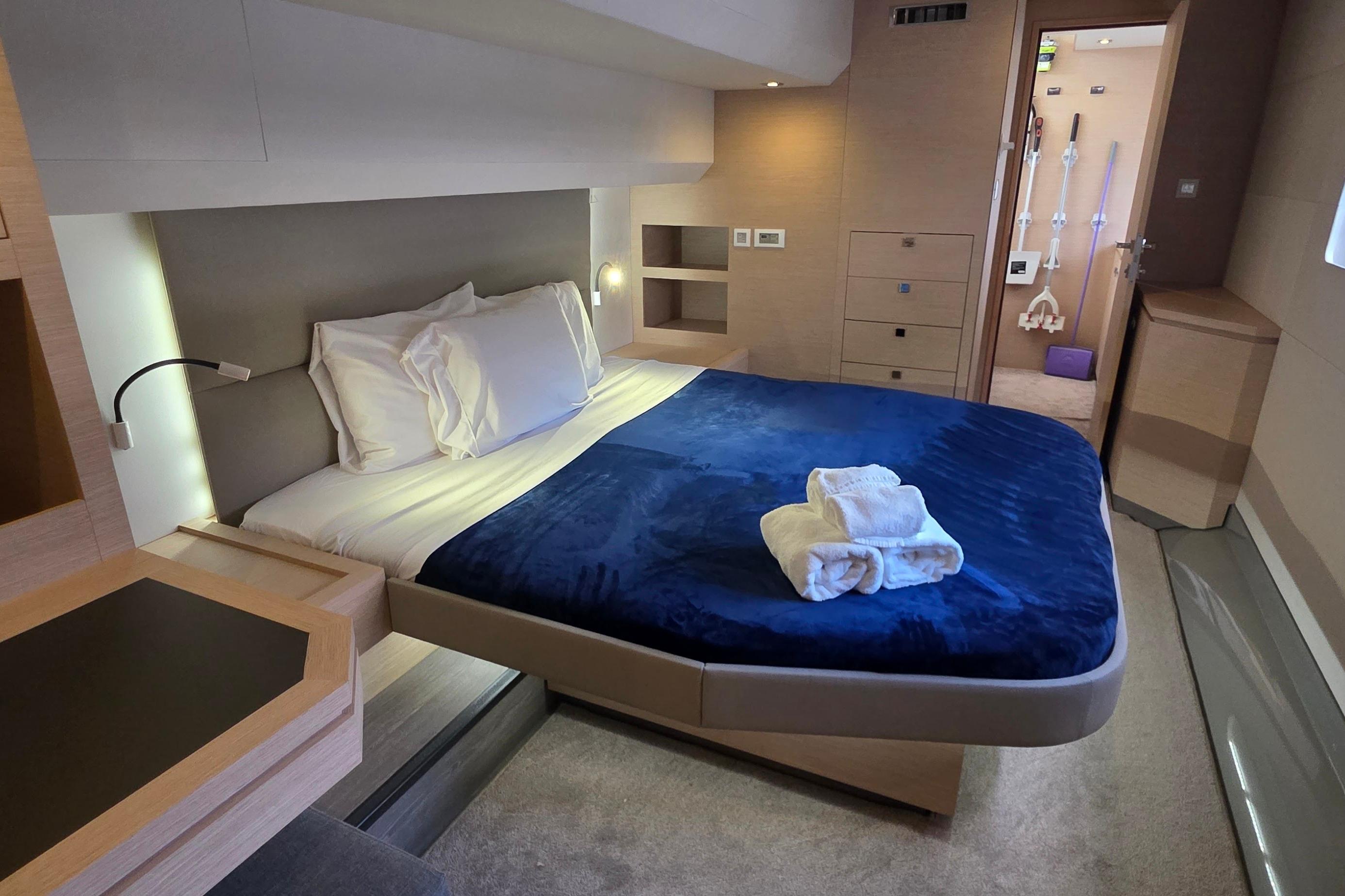 Luxurious bedroom interior of 2018 Fountaine Pajot Motor Yacht 44 with modern design.