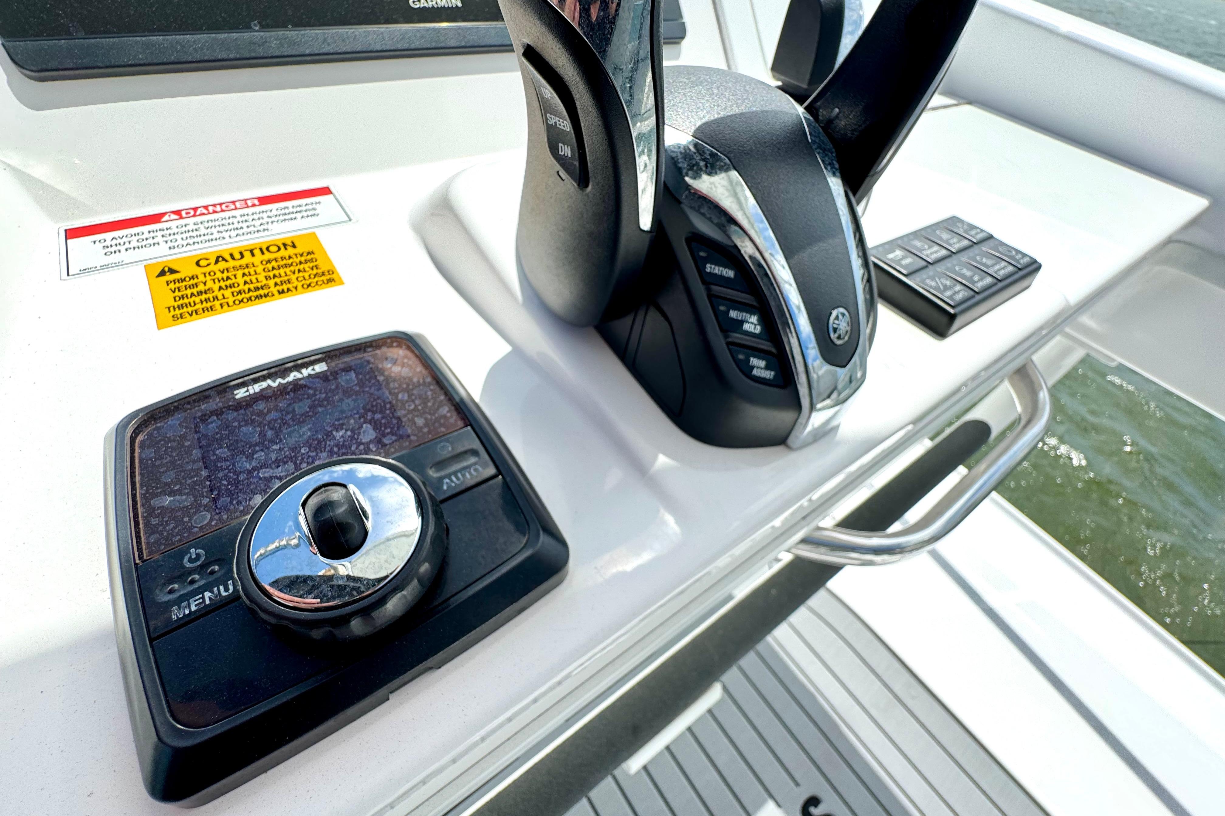 Control panel of 2023 Everglades 395 Center Console boat with navigation equipment.