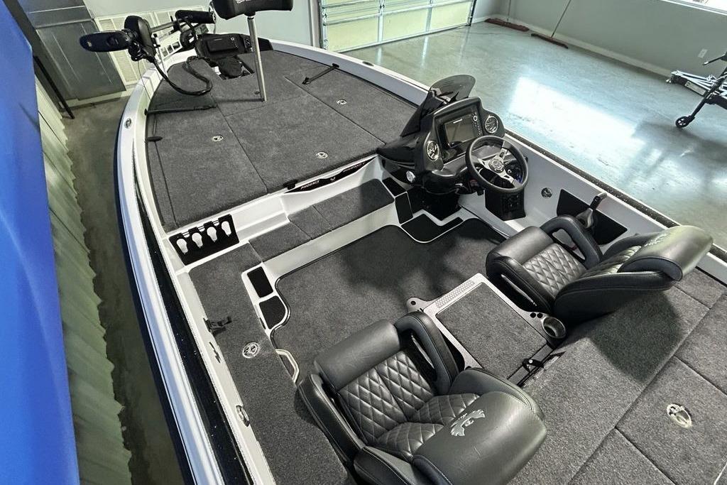 Interior of a 2026 Phoenix 818 Pro boat with dual seats and steering console.