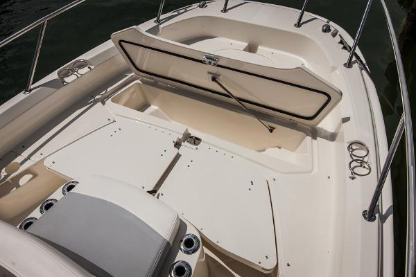 Manufacturer Provided Image: 2014 Boston Whaler 210 Dauntless boat with open storage compartment.