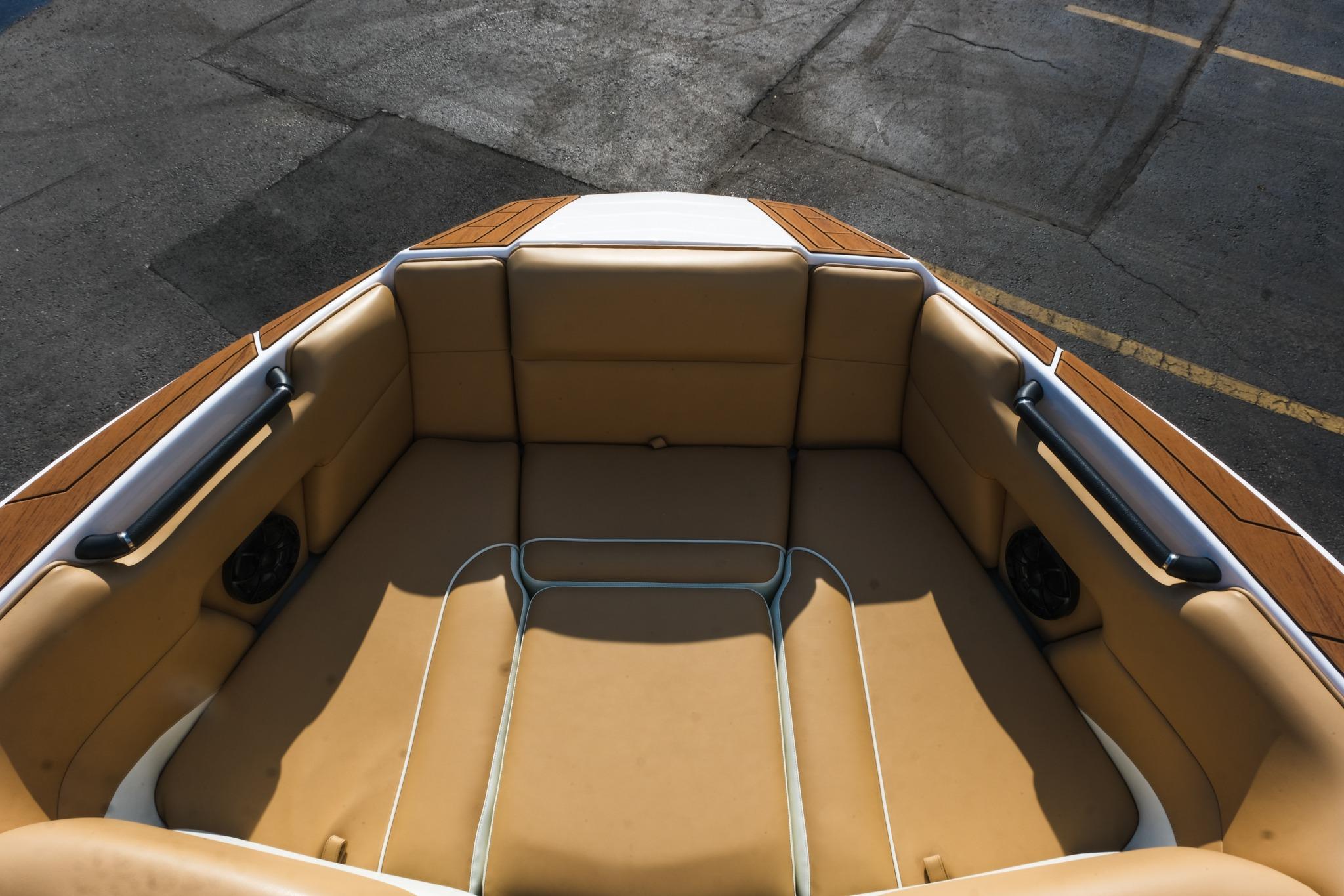 2023 Moomba Mondo boat interior with tan seating and sleek design.