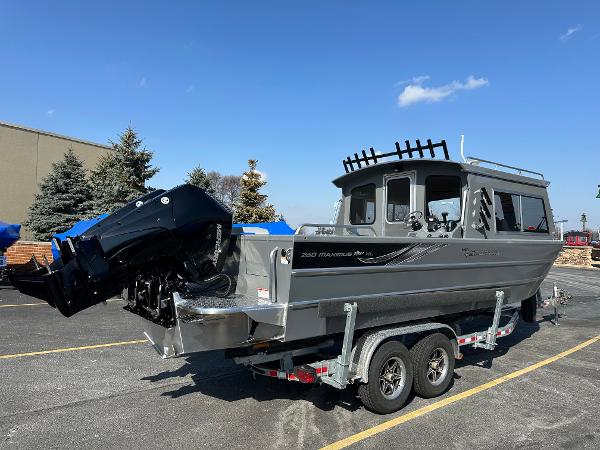 2024 Spartan 260 Maximus Pro XL boat on a trailer in a parking lot.