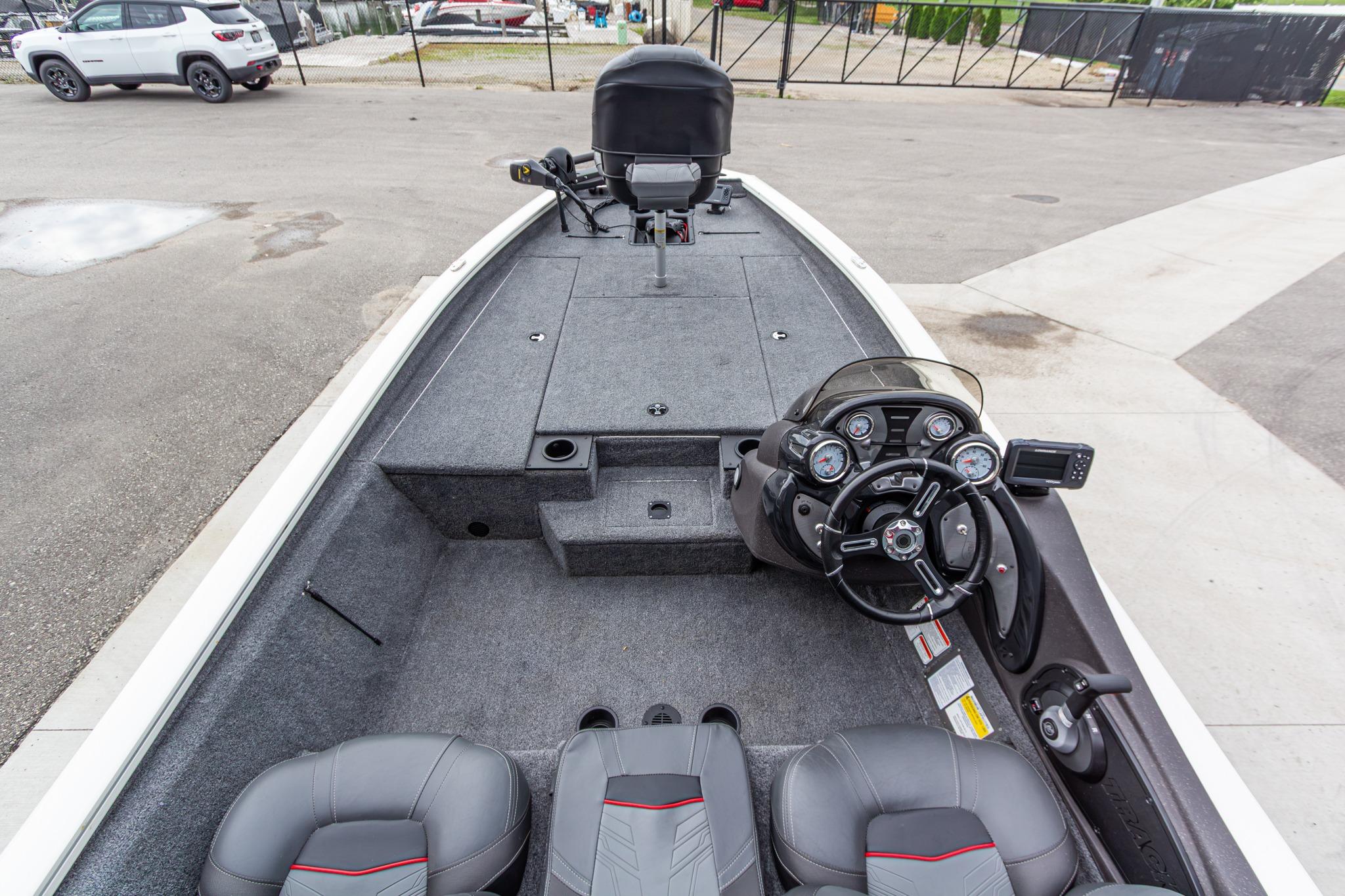 2023 Tracker Pro Team 190 TX boat interior with steering console and seating.