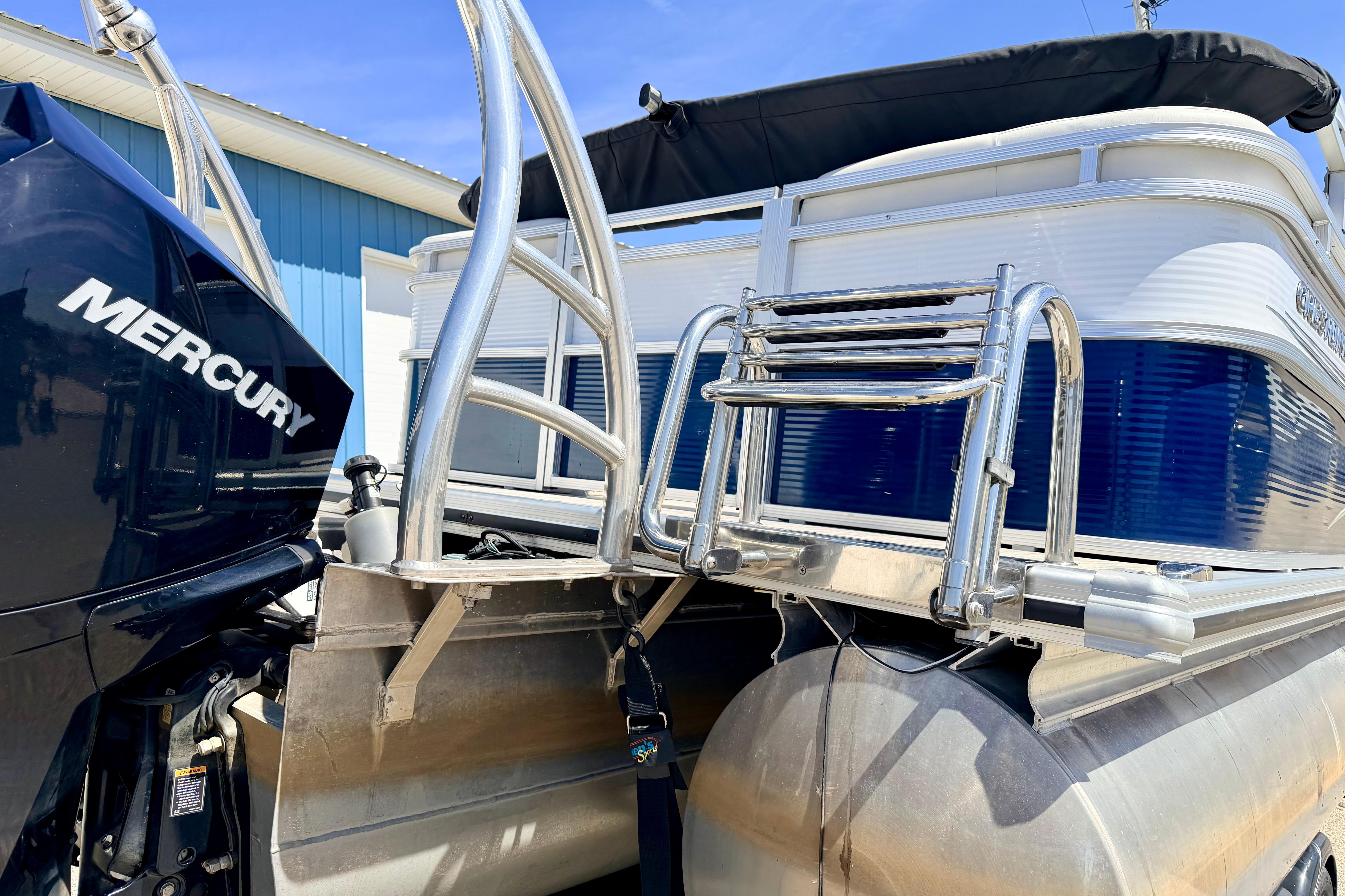 2019 Crestliner 240 Rally DX CW pontoon boat with Mercury outboard motor.
