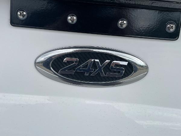 Cape Horn 24XS 2026 model emblem on a white surface with metallic finish.