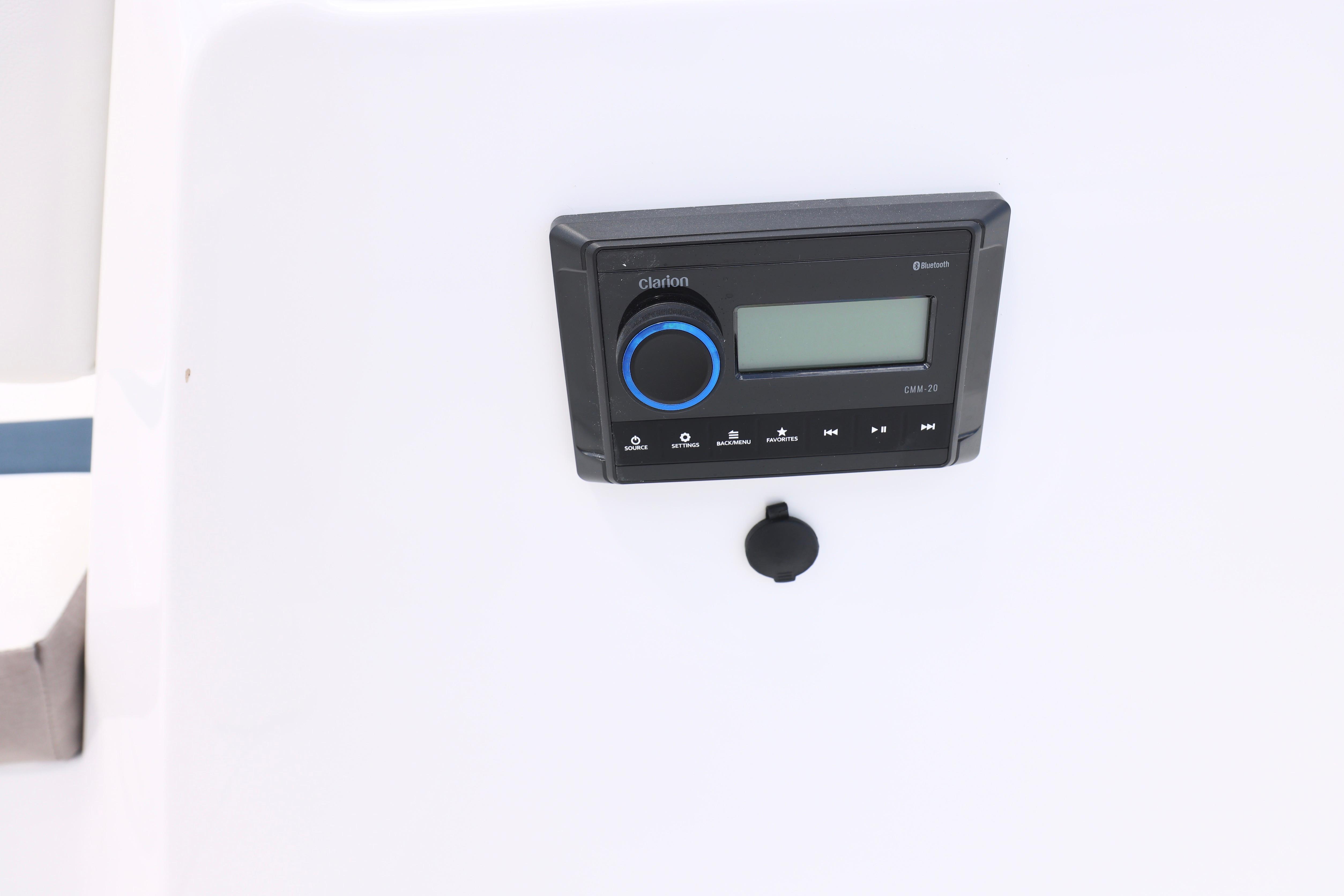 2026 Hurricane SunDeck Sport 205 OB boat stereo system with Bluetooth connectivity.