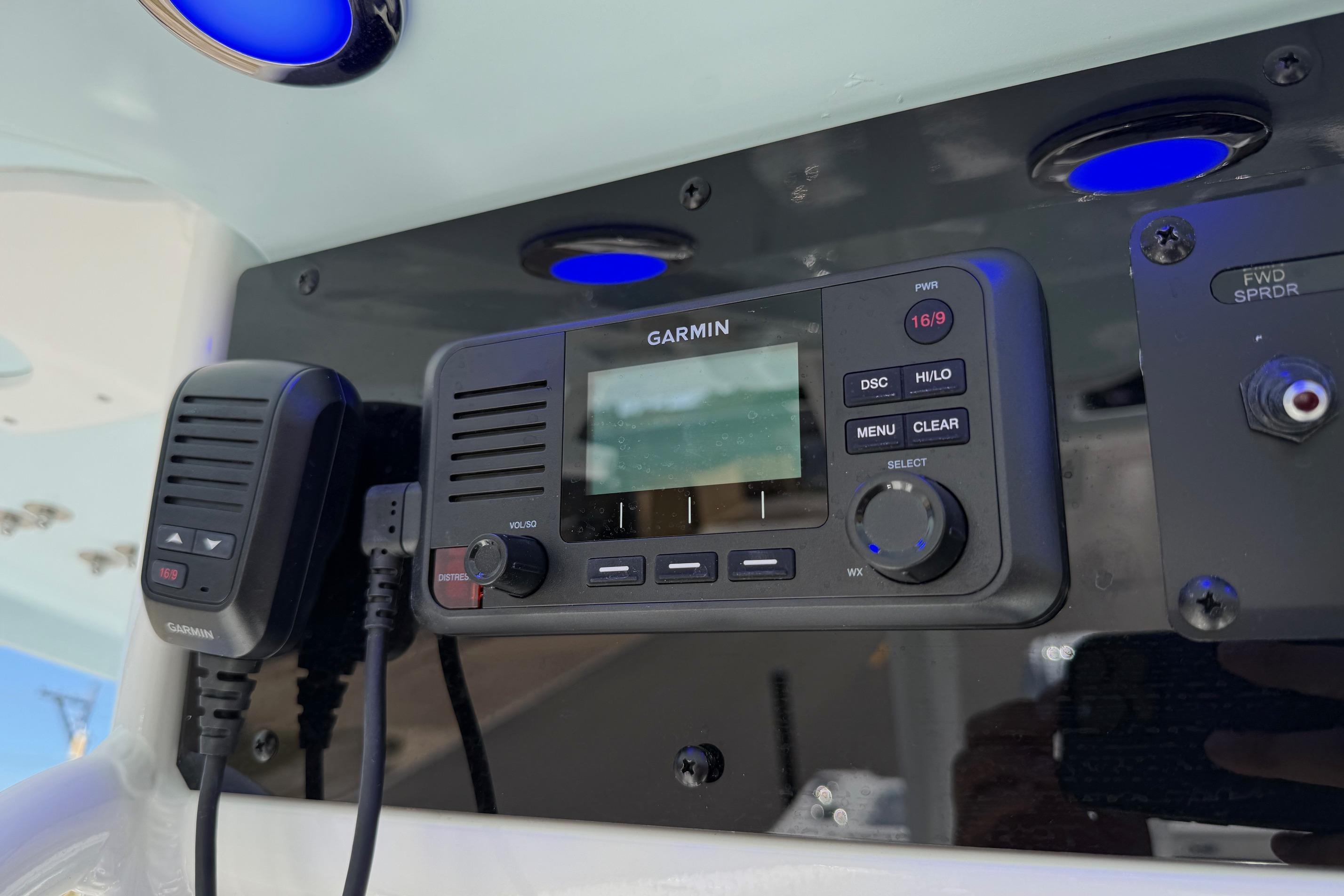 Garmin marine radio on 2026 Sea Hunt Gamefish 30 Coffin Box boat dashboard.