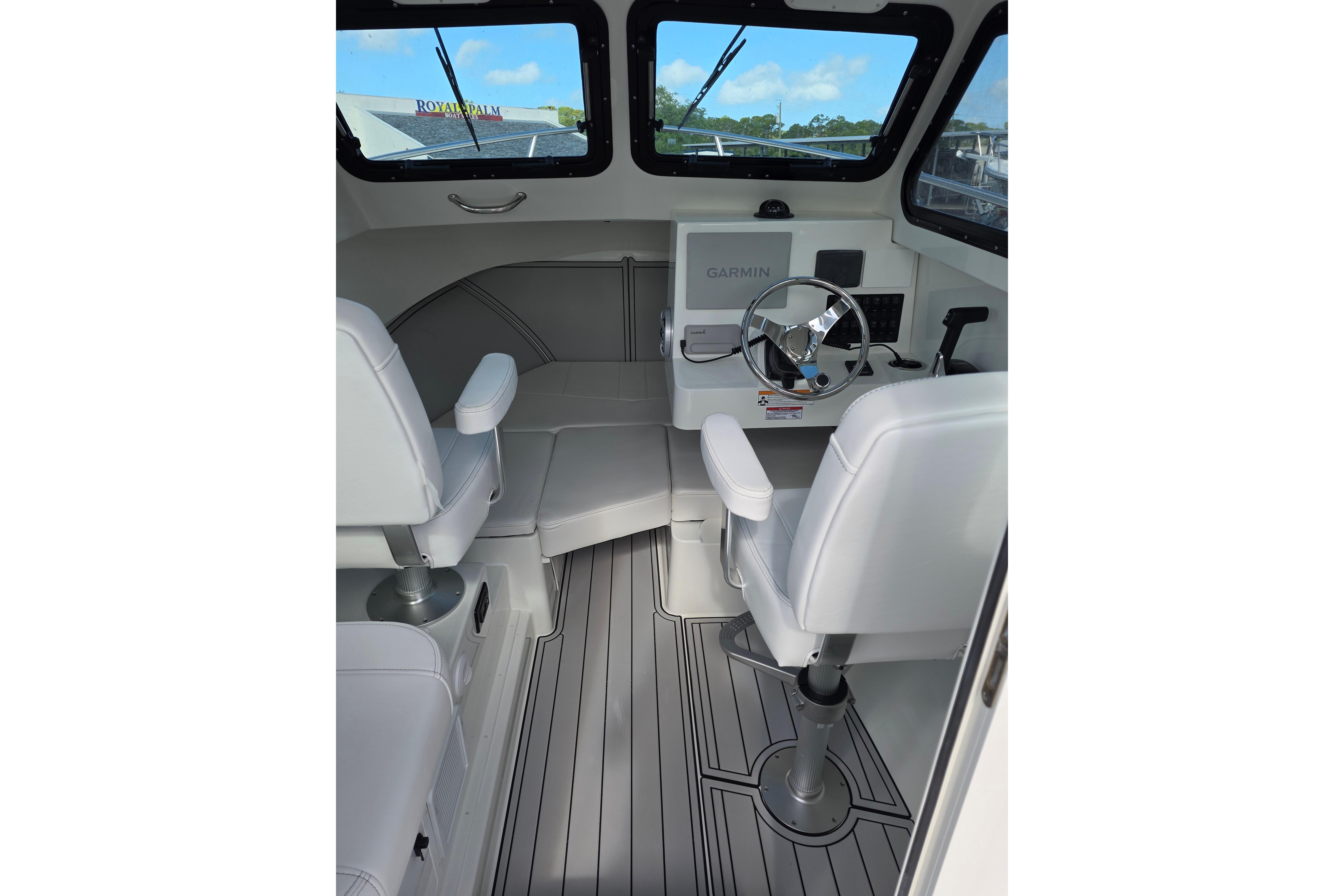 Interior of 2026 Parker 227 Explorer boat with modern helm and seating.