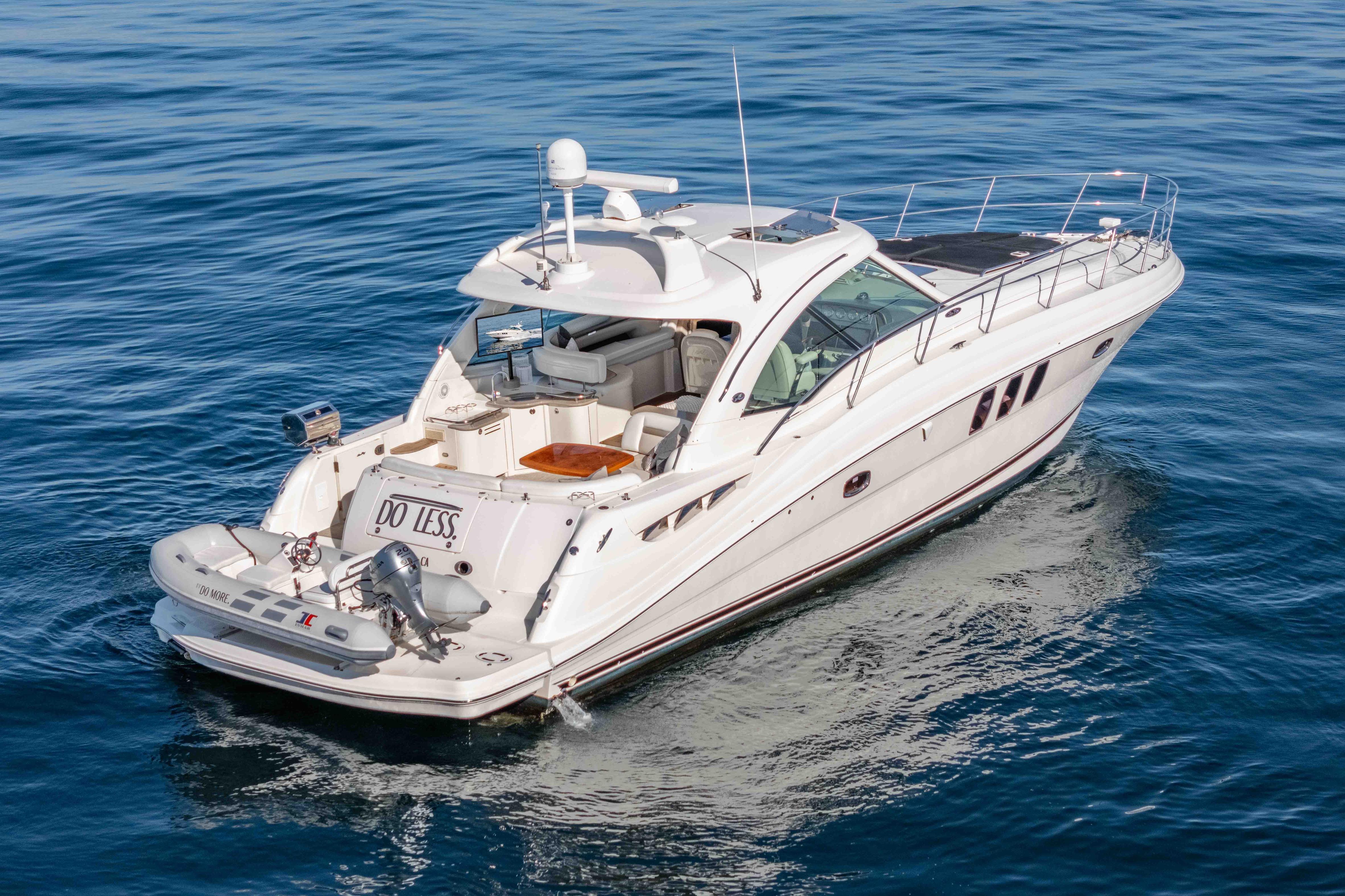 2007 Sea Ray 48 Sundancer yacht cruising on calm blue waters.