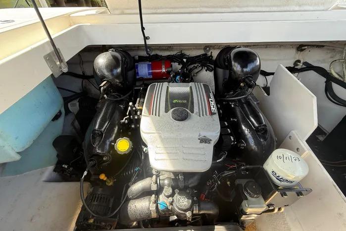 Engine compartment of a 2014 Sea Ray 260 Sundeck boat, featuring a MerCruiser engine.