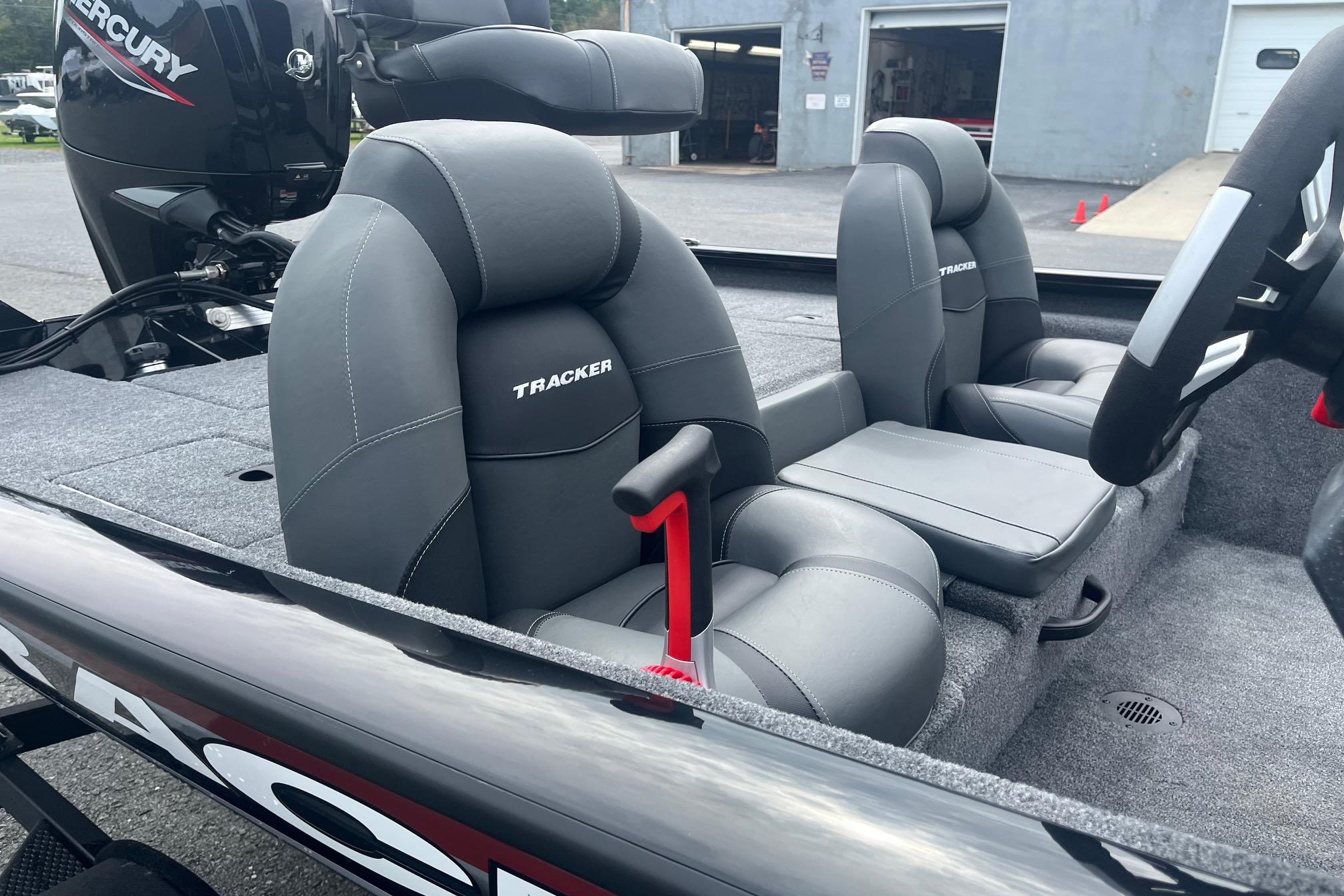 2026 Tracker Pro Team 175 boat interior with gray seating and Mercury engine.