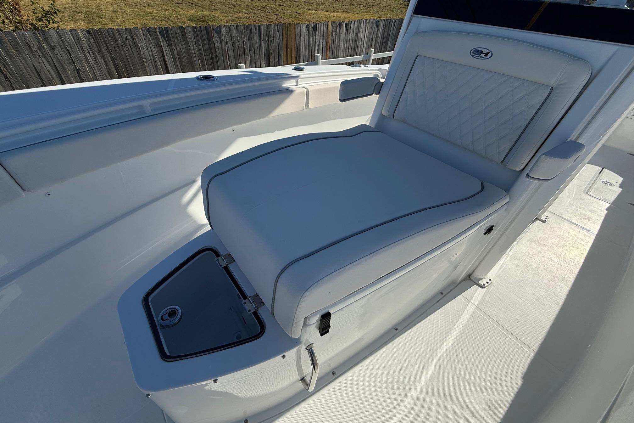 2026 Sea Hunt Ultra 275 Coffin Box boat interior with cushioned seating.