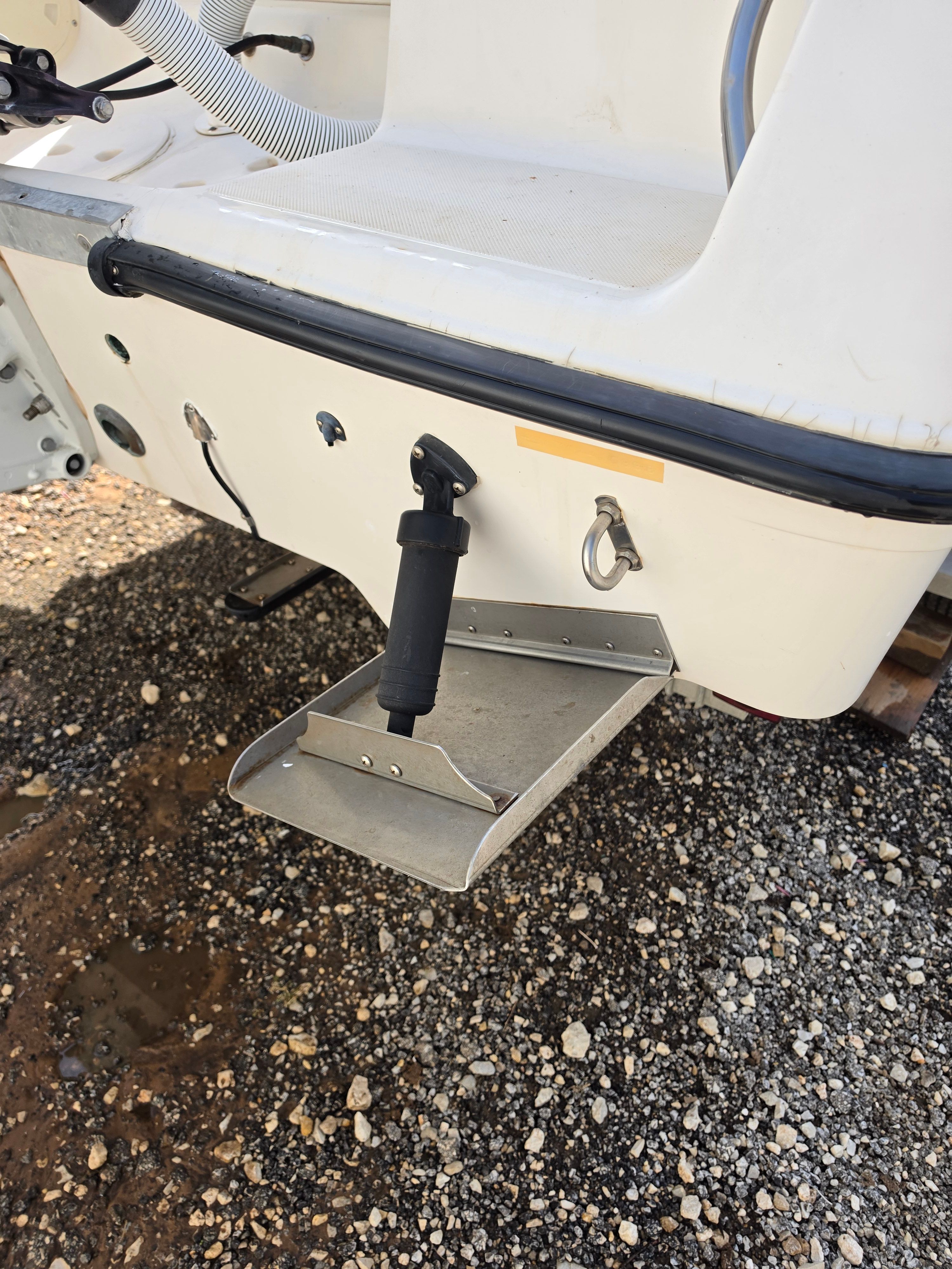 The image shows the stern of a 1998 Hydra-Sports 2450 boat with a step platform.
