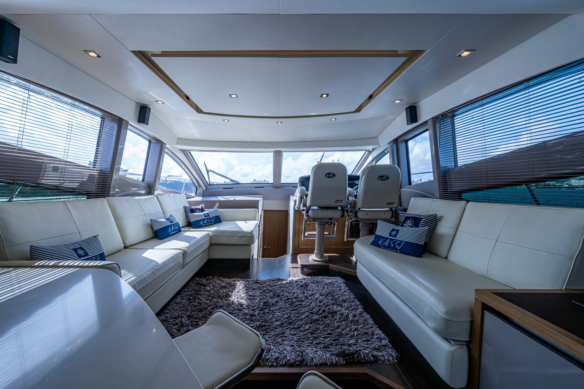 Luxurious interior of 2018 Sea Ray L550 Fly yacht with plush seating and modern design.