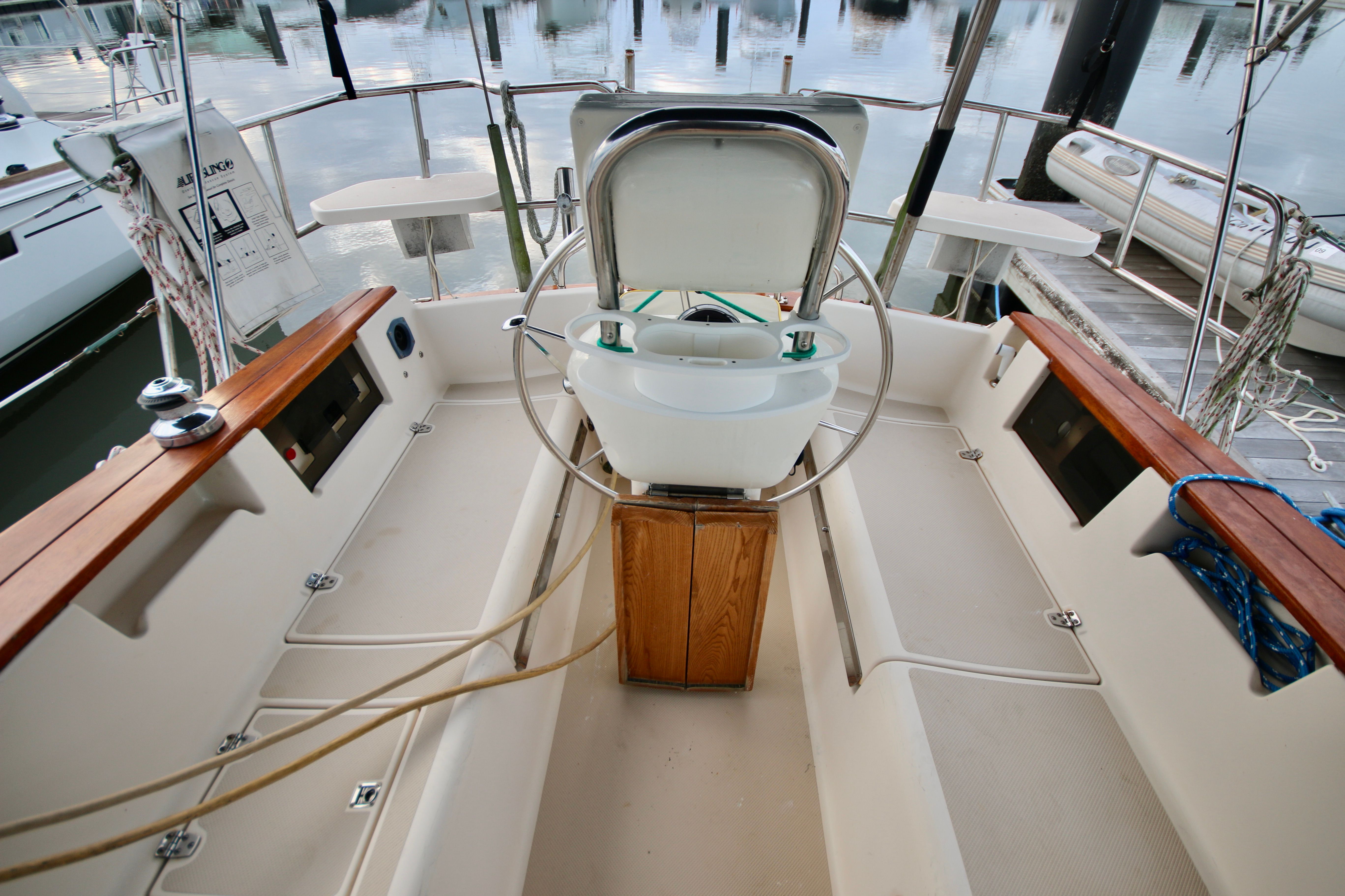 Cockpit of 2002 Island Packet 380 sailboat docked at marina.