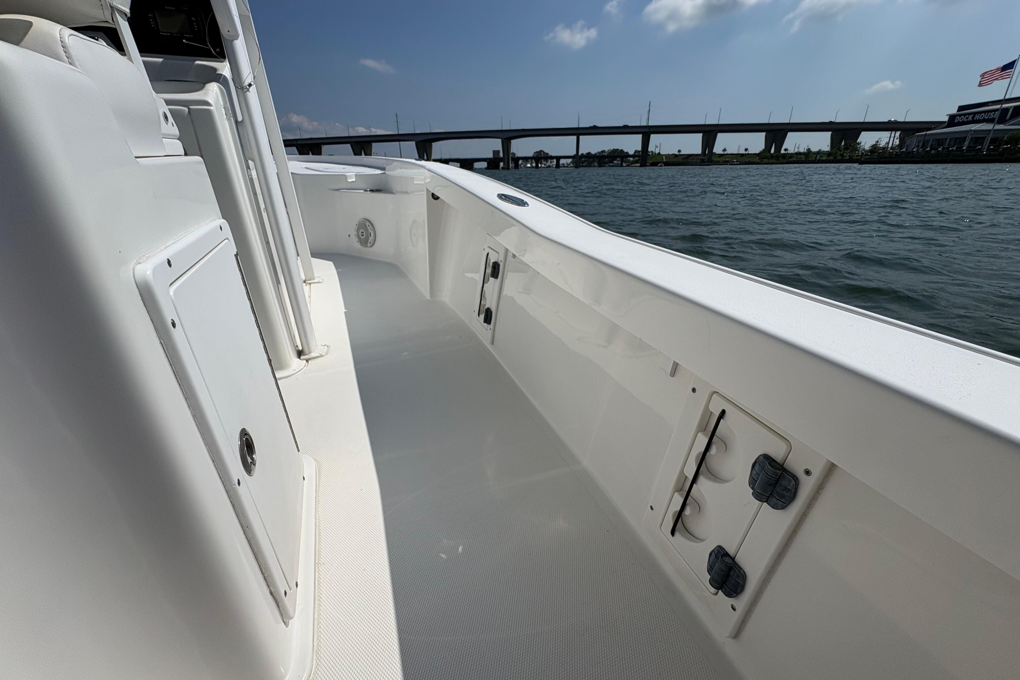 2017 Sea Hunt BX 25 BR boat interior with water and bridge view.